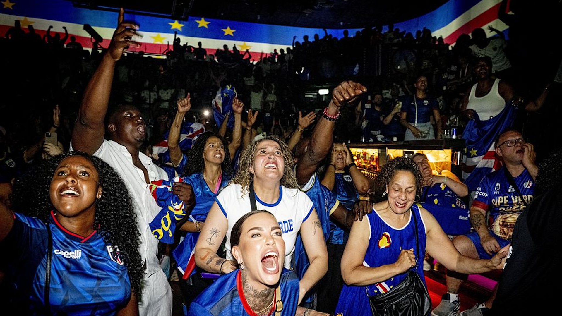 Cape Verde supporters cheer on their team