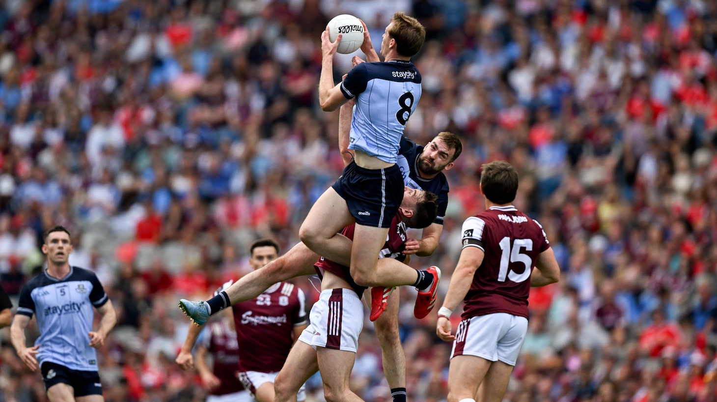 Peadar Ó Cofaigh Byrne of Dublin goes highest to win possession during the GAA Football All-Ireland Senior Championship quarter-final match between Dublin and Galway.