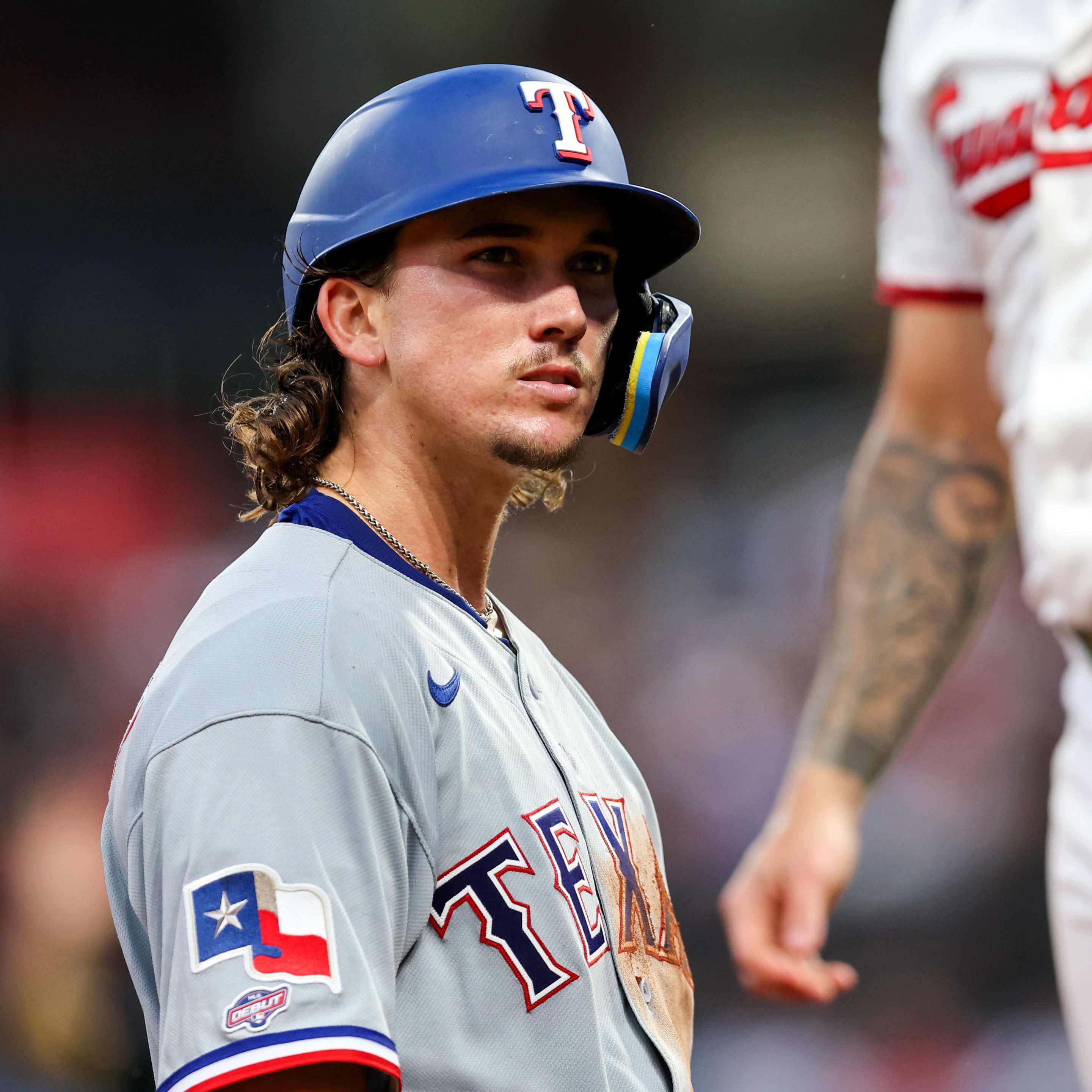 Texas Rangers second baseman Cameron Cauley (27), in his major league debut, reacts after hitting a triple for his first major league hit during the seventh inning of the Major League Baseball game between the Texas Rangers and Cleveland Guardians on June 29, 2026
