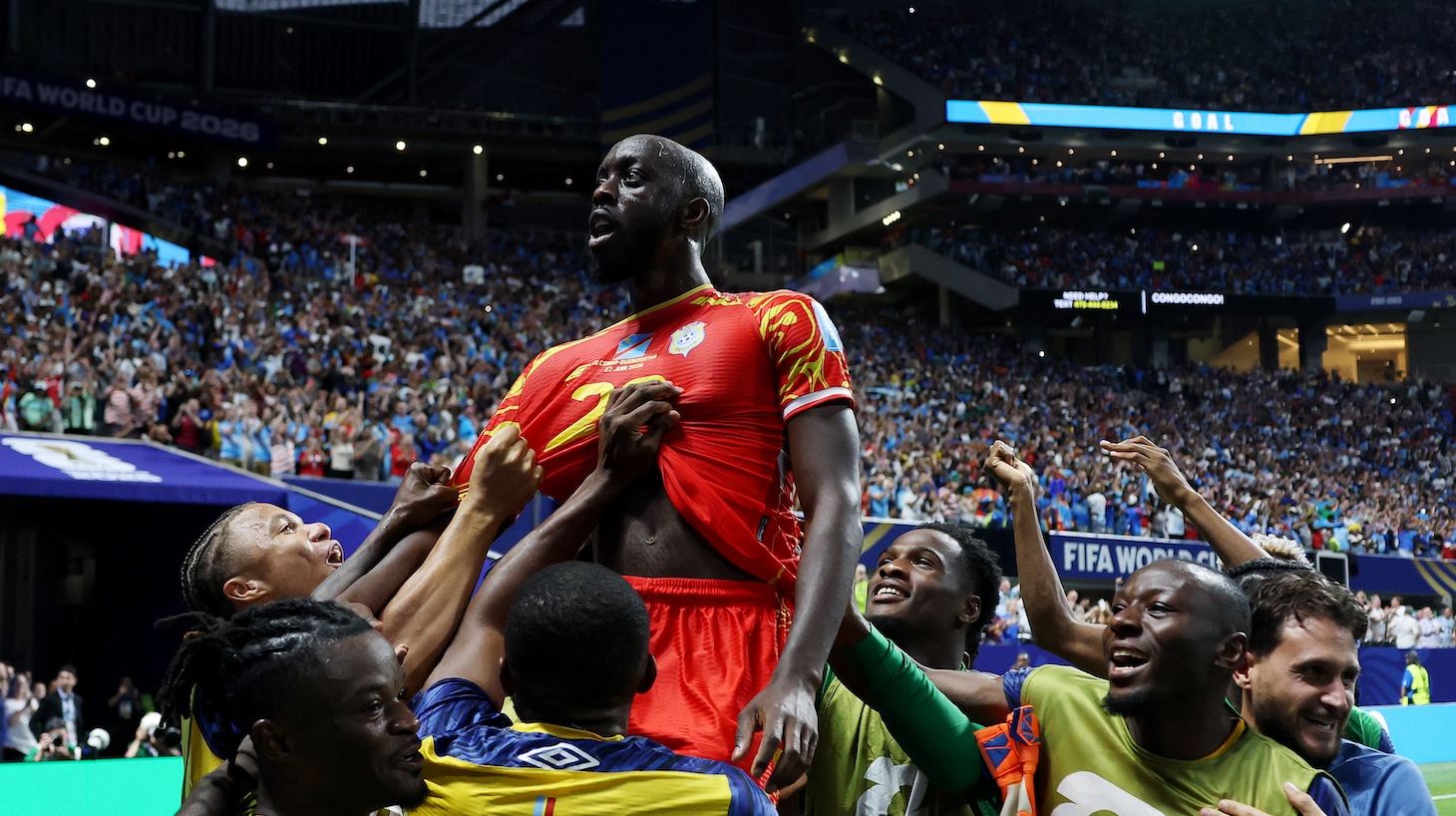 Yoane Wissa of Congo DR celebrates with teammates after scoring the team's third goal during the FIFA World Cup 2026 Group K match between Congo DR and Uzbekistan.