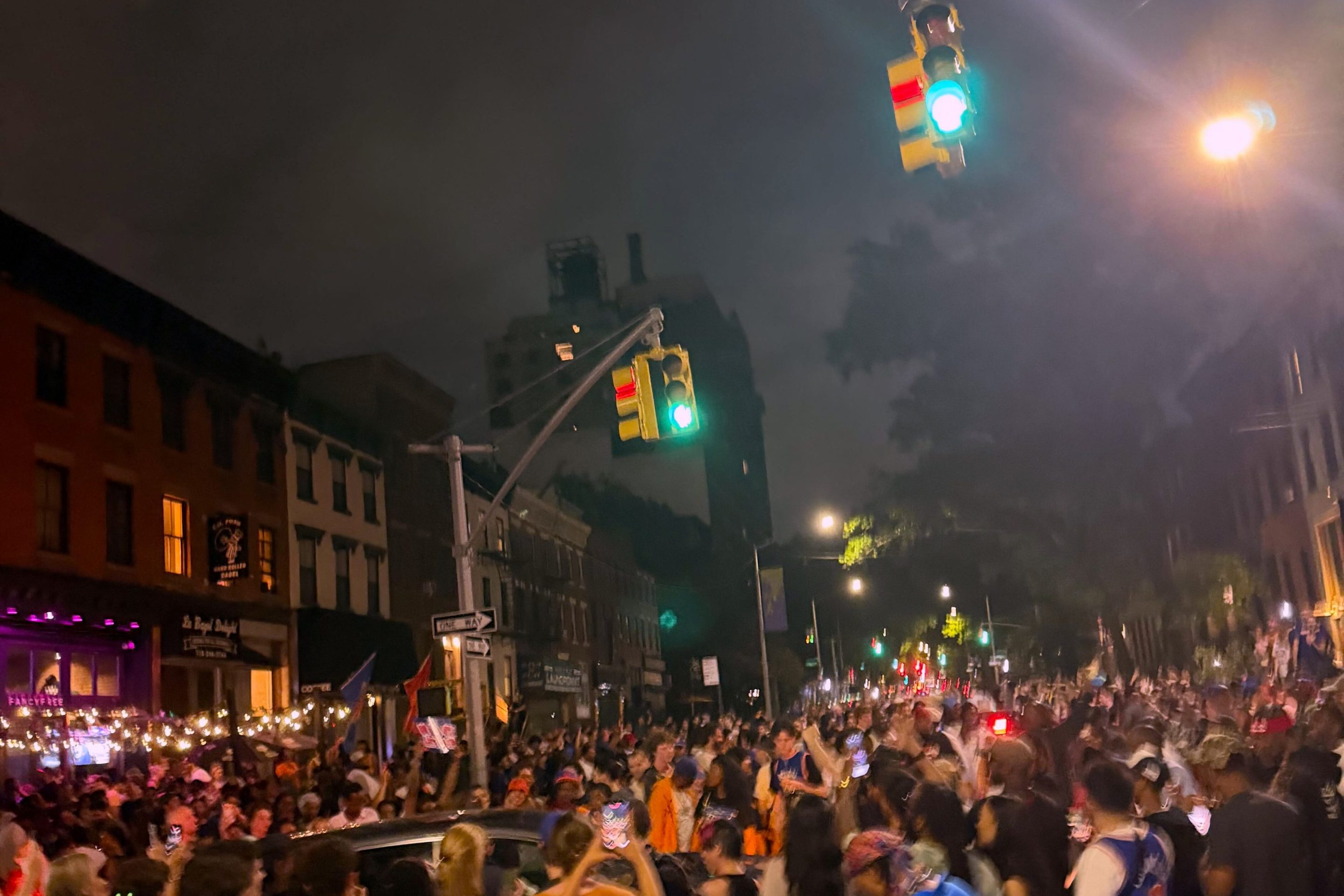 A large group of hundreds of New Yorkers reveling after Game 4 of the NBA Finals
