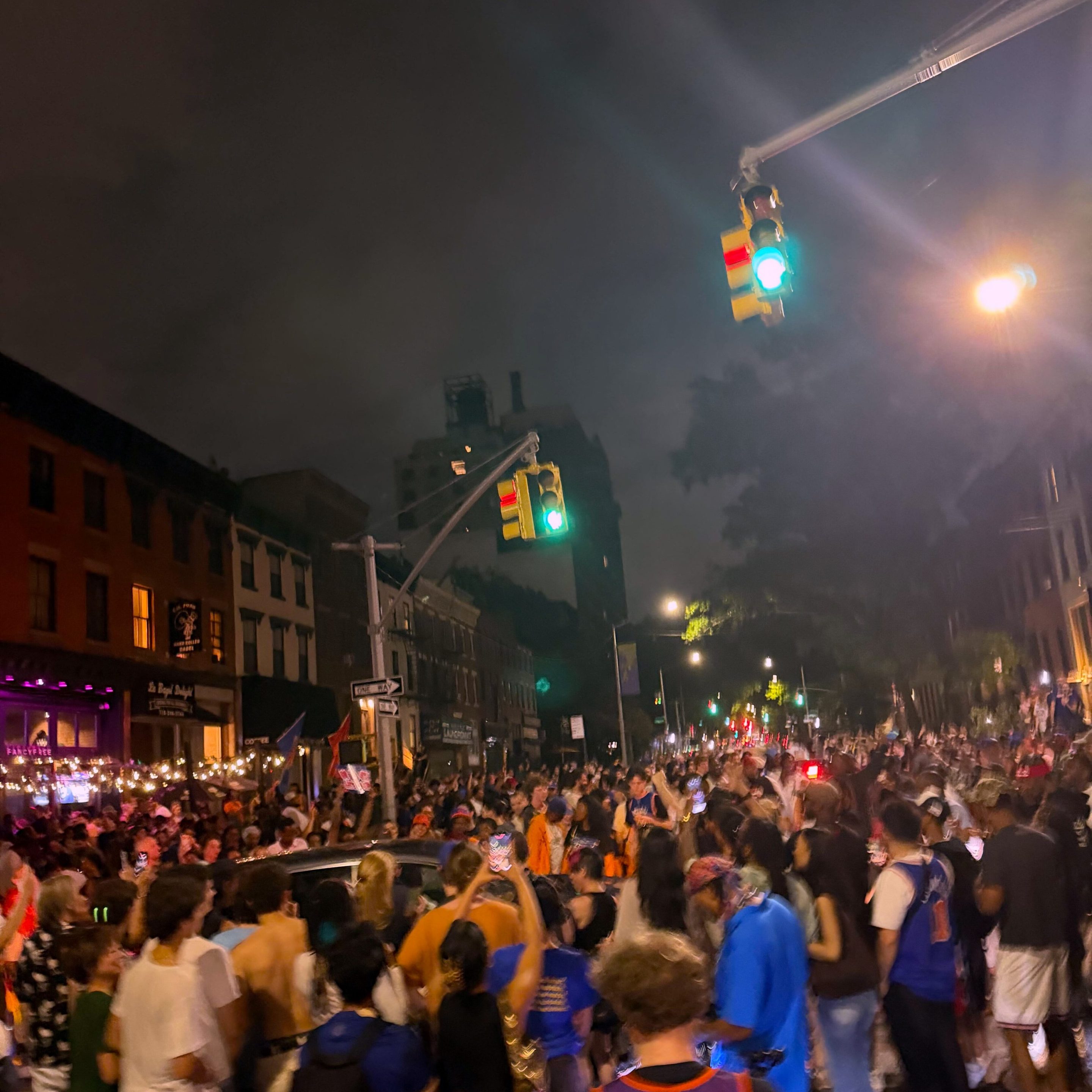 A large group of hundreds of New Yorkers reveling after Game 4 of the NBA Finals