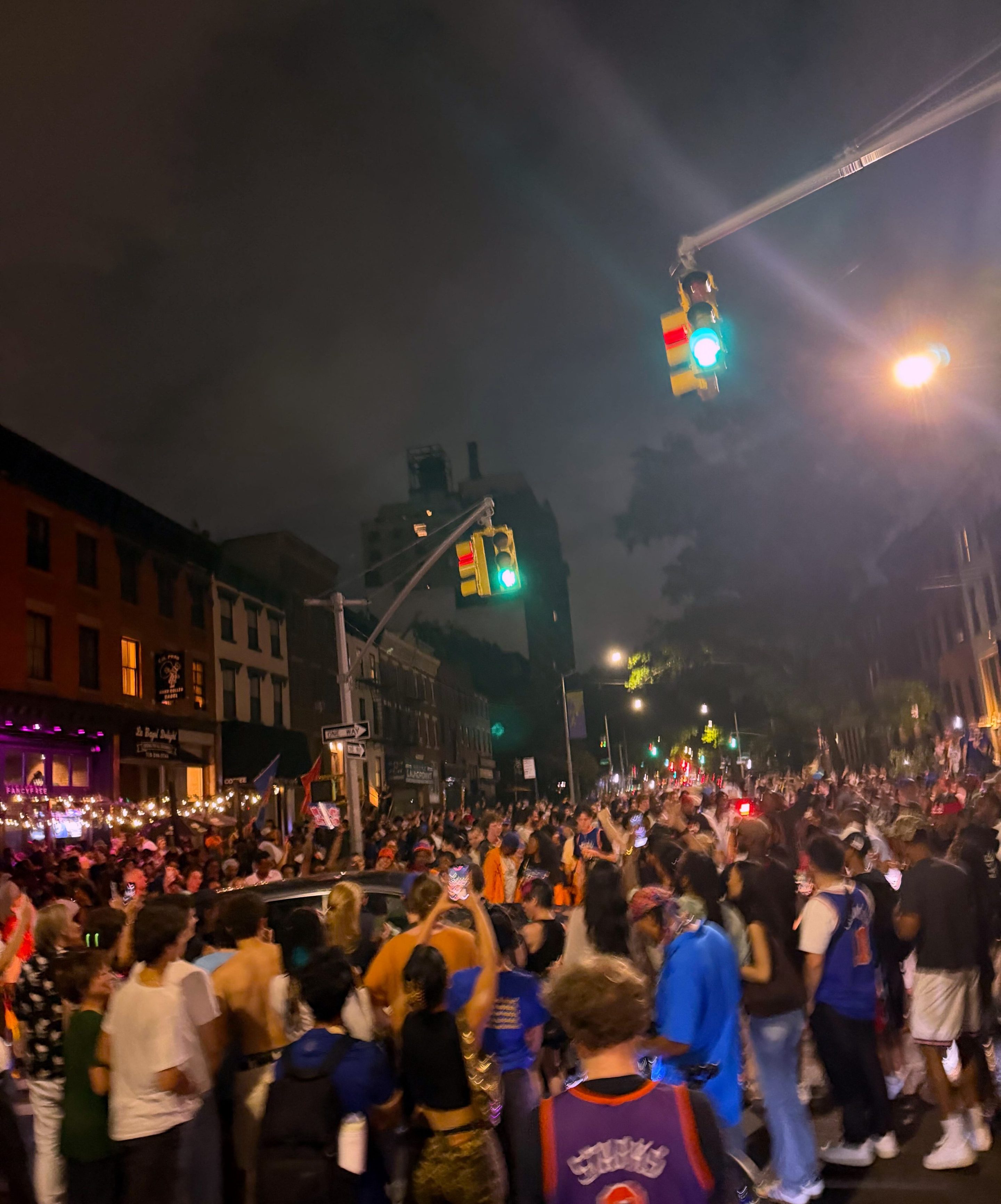 A large group of hundreds of New Yorkers reveling after Game 4 of the NBA Finals