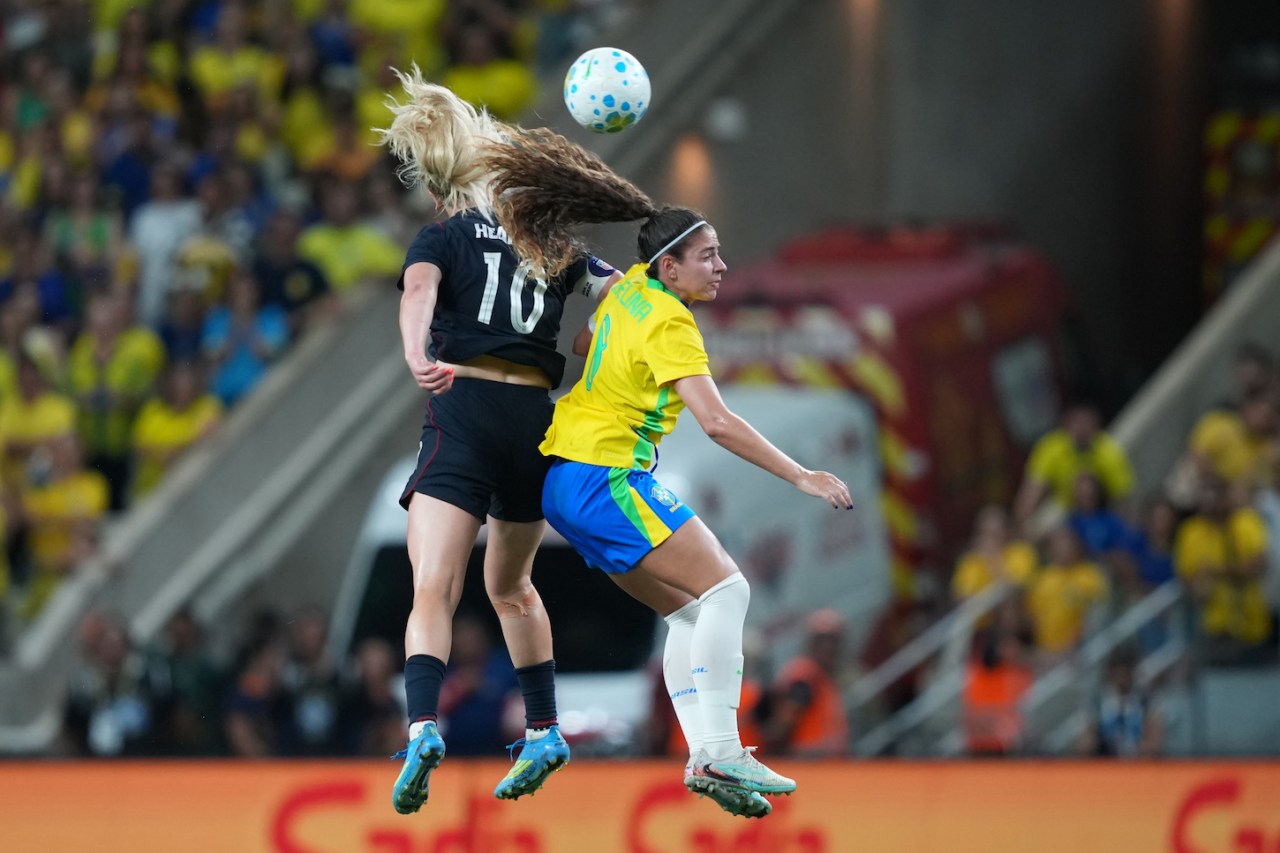 Angelina of Brazil competes for the ball with Lindsey Heaps of United States during the international friendly match between Brazil and United States on June 09, 2026 in Fortaleza, Brazil.