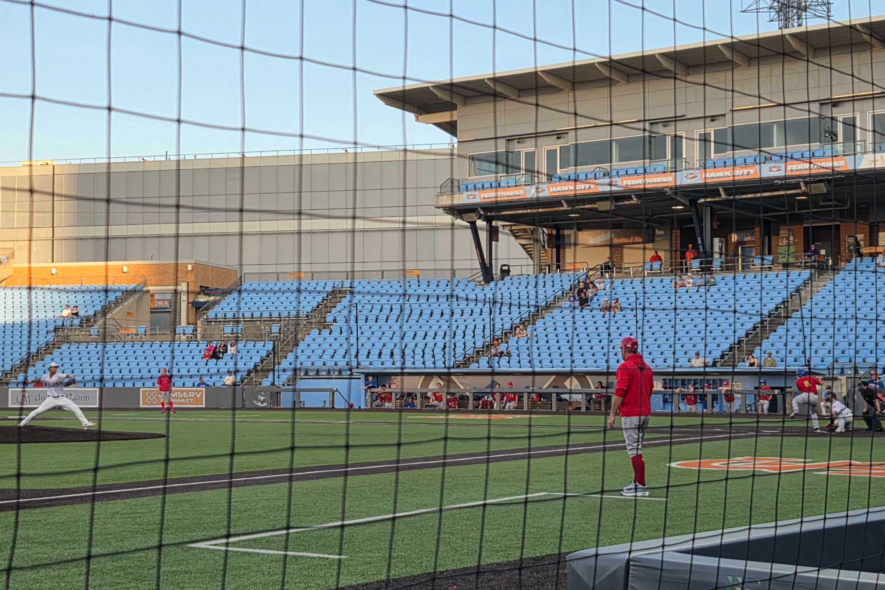 view of a mostly empty ballpark, from low on the third base side, at the FerryHawks play the Rockers