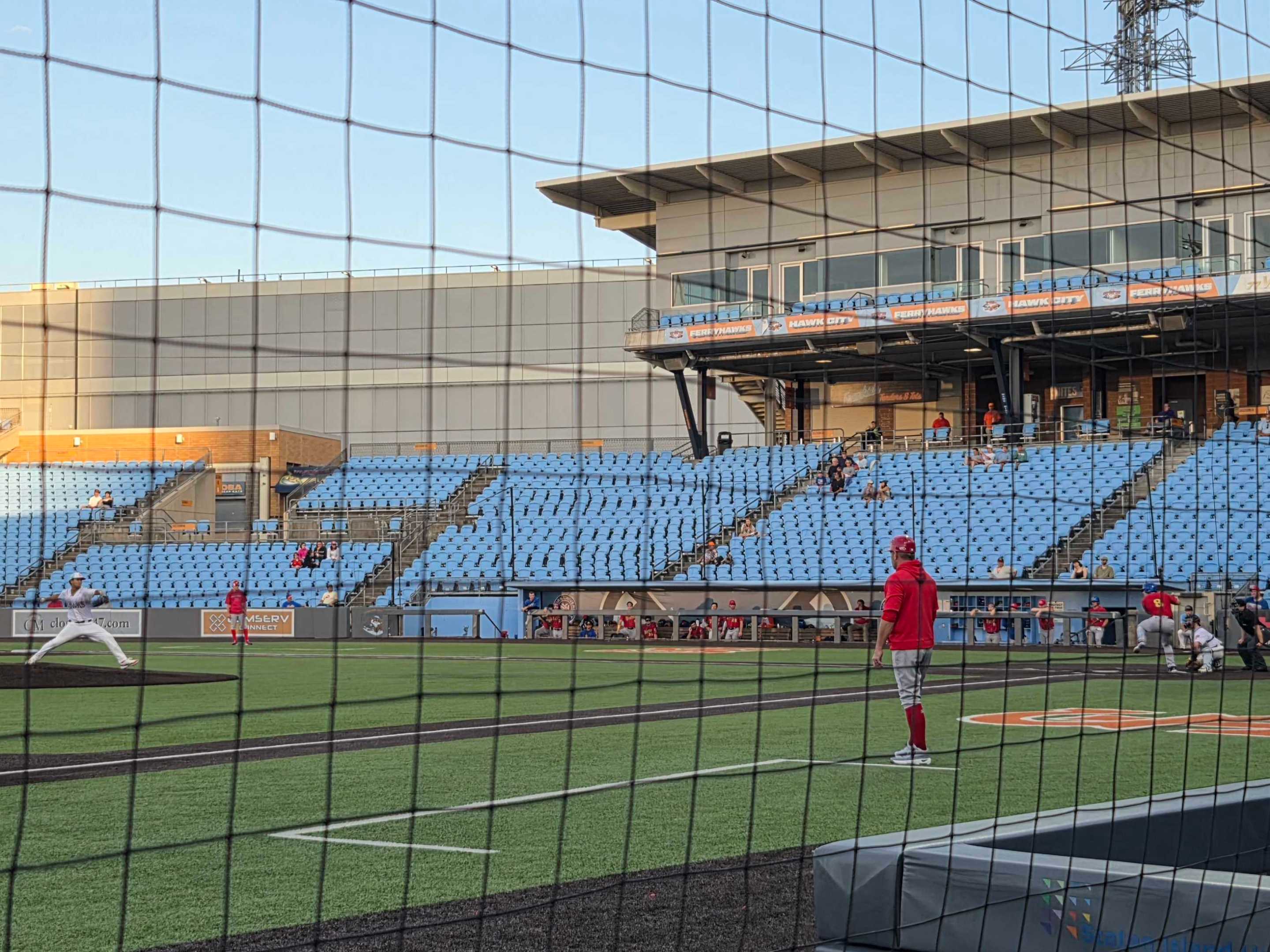 view of a mostly empty ballpark, from low on the third base side, at the FerryHawks play the Rockers