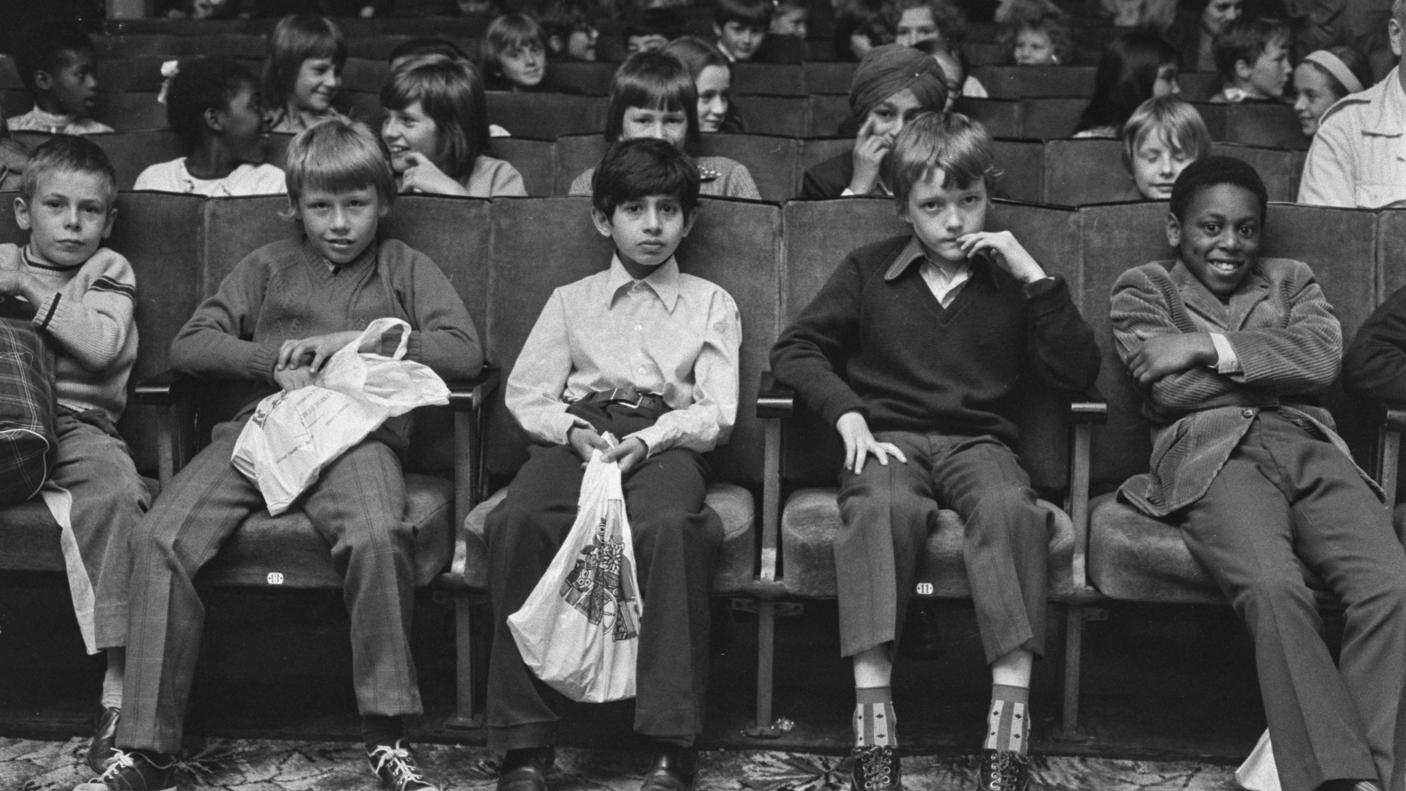 Children watching a movie at the Bankside Film Theatre in London, UK, 27th July 1973. (Photo by Evening Standard/Hulton Archive/Getty Images)