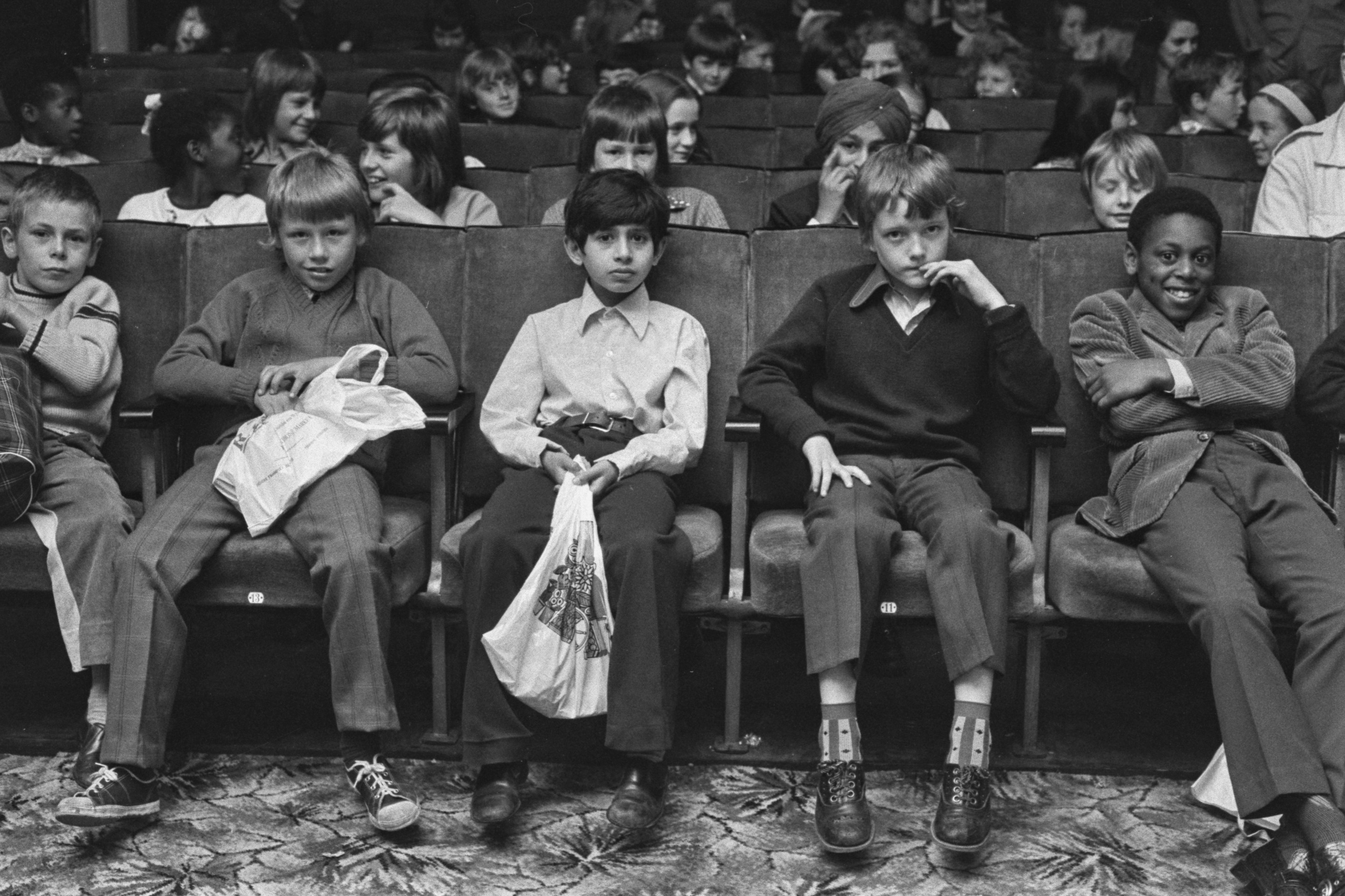 Children watching a movie at the Bankside Film Theatre in London, UK, 27th July 1973. (Photo by Evening Standard/Hulton Archive/Getty Images)