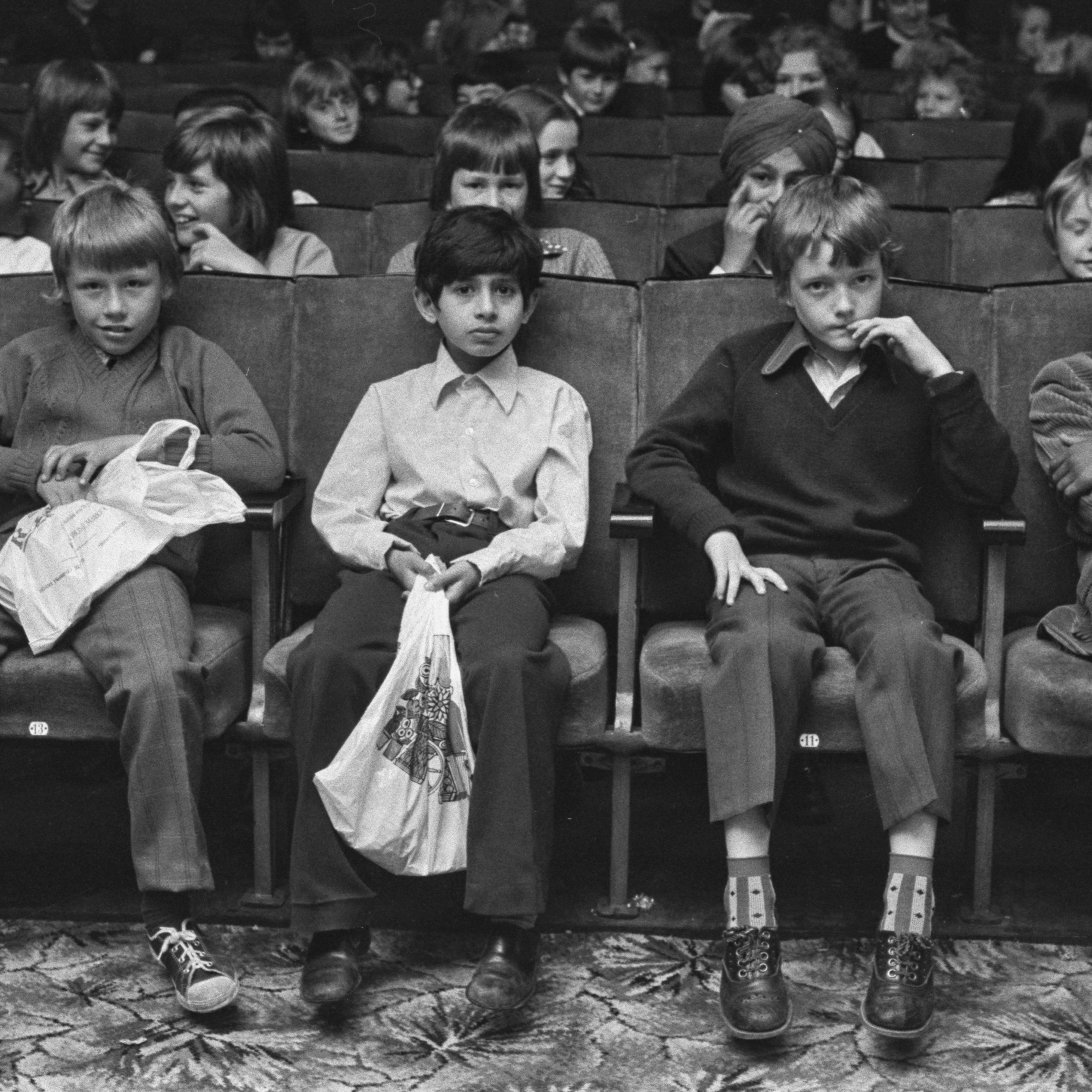 Children watching a movie at the Bankside Film Theatre in London, UK, 27th July 1973. (Photo by Evening Standard/Hulton Archive/Getty Images)
