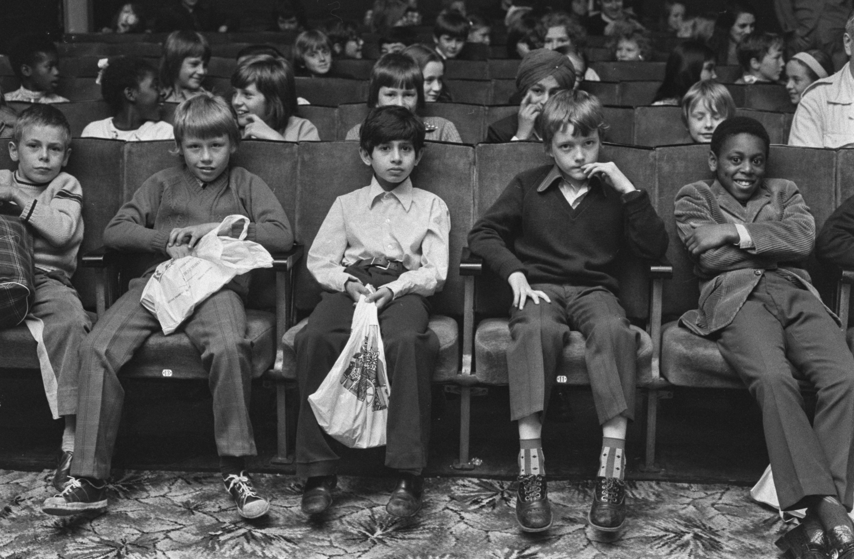 Children watching a movie at the Bankside Film Theatre in London, UK, 27th July 1973. (Photo by Evening Standard/Hulton Archive/Getty Images)
