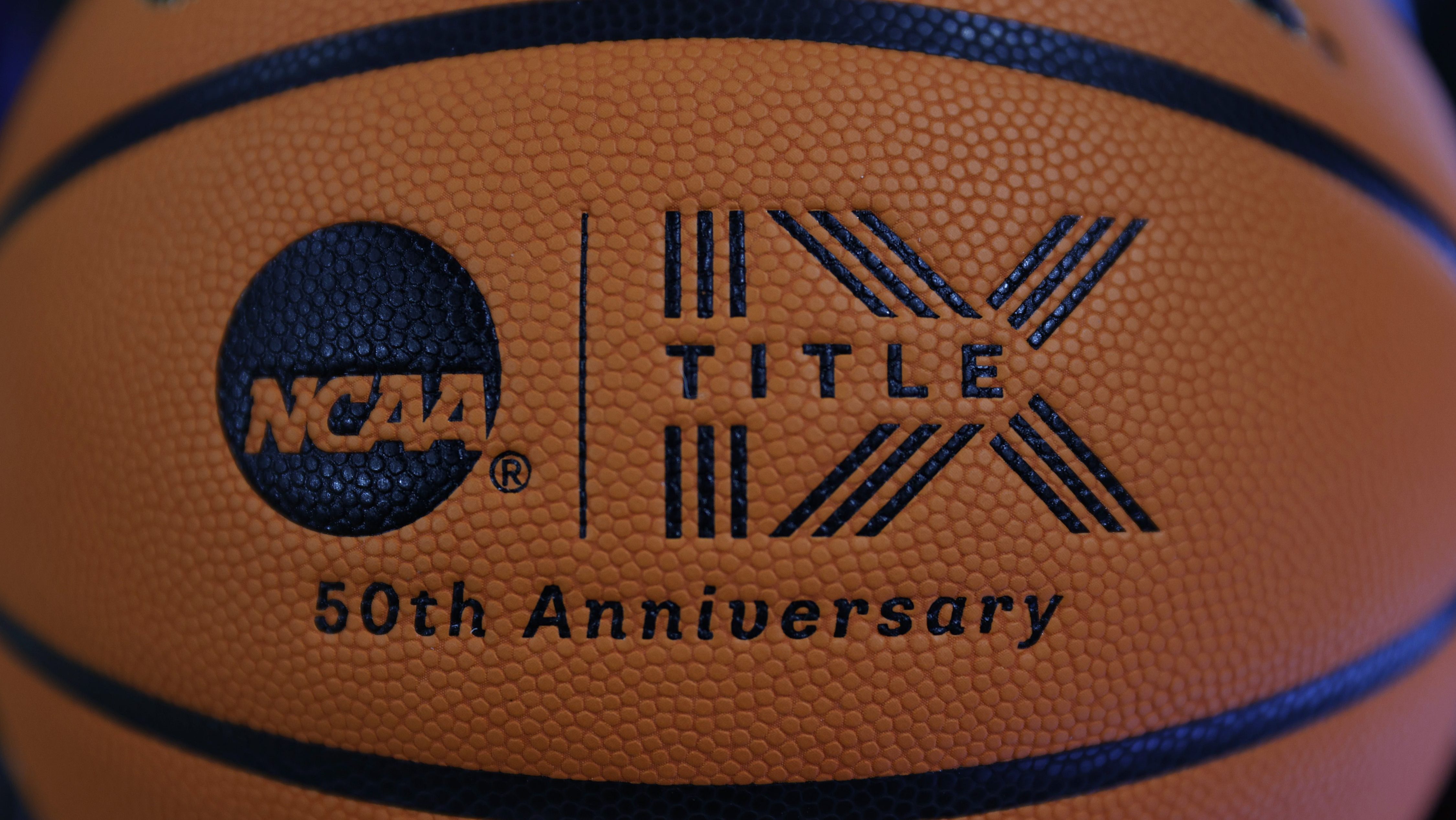 A detail of a Title IX logo on a basketball is seen before the Women's NCAA Basketball Tournament at Climate Pledge Arena on March 22, 2023 in Seattle, Washington.