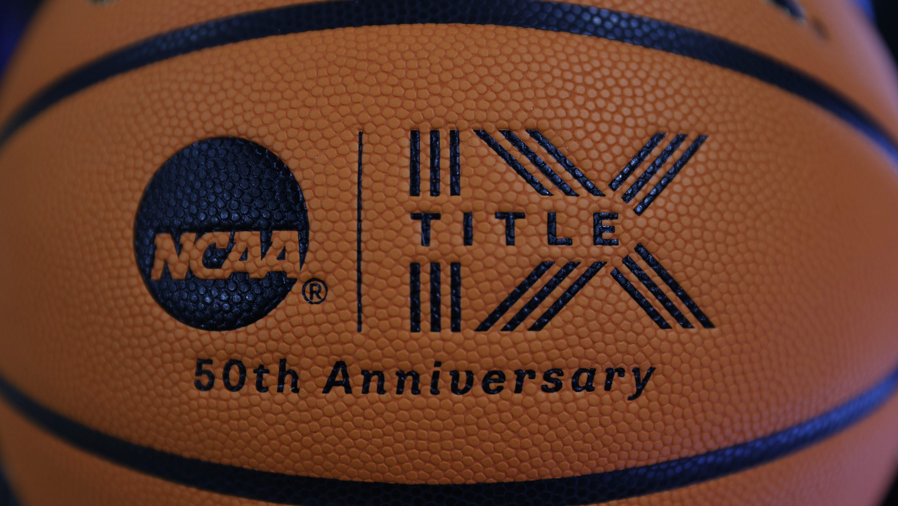 A detail of a Title IX logo on a basketball is seen before the Women's NCAA Basketball Tournament at Climate Pledge Arena on March 22, 2023 in Seattle, Washington.