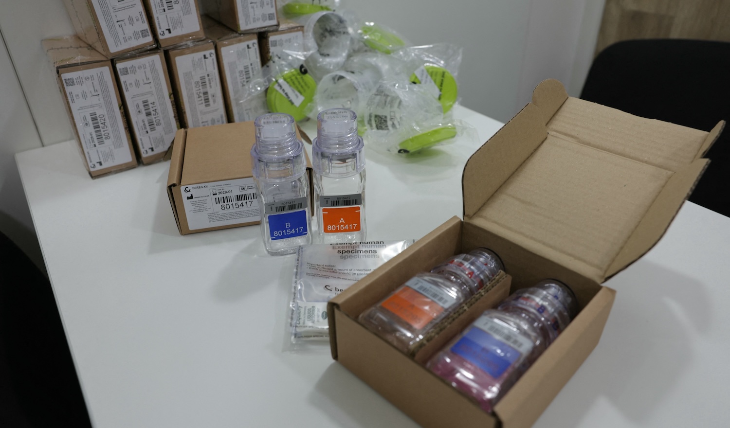 This photograph taken on July 5, 2024, shows anti-doping testing kit materials displayed at the International Testing Agency (ITA) testing facility inside a truck at the finish line of the 7th stage of the 111th edition of the Tour de France cycling race, 25,3 km individual time trial between Nuits-Saint-Georges and Gevrey-Chambertin. The overall leader yellow jersey rider and stage winner are systematically summoned to be tested for doping after the day's stage, along with any rider selected by ITA based on performance or intelligence from the organisation's investigative department. A chaperon escorts the rider to the facility where a supervised urine sample is collected for testing. (Photo by Thomas SAMSON / AFP)