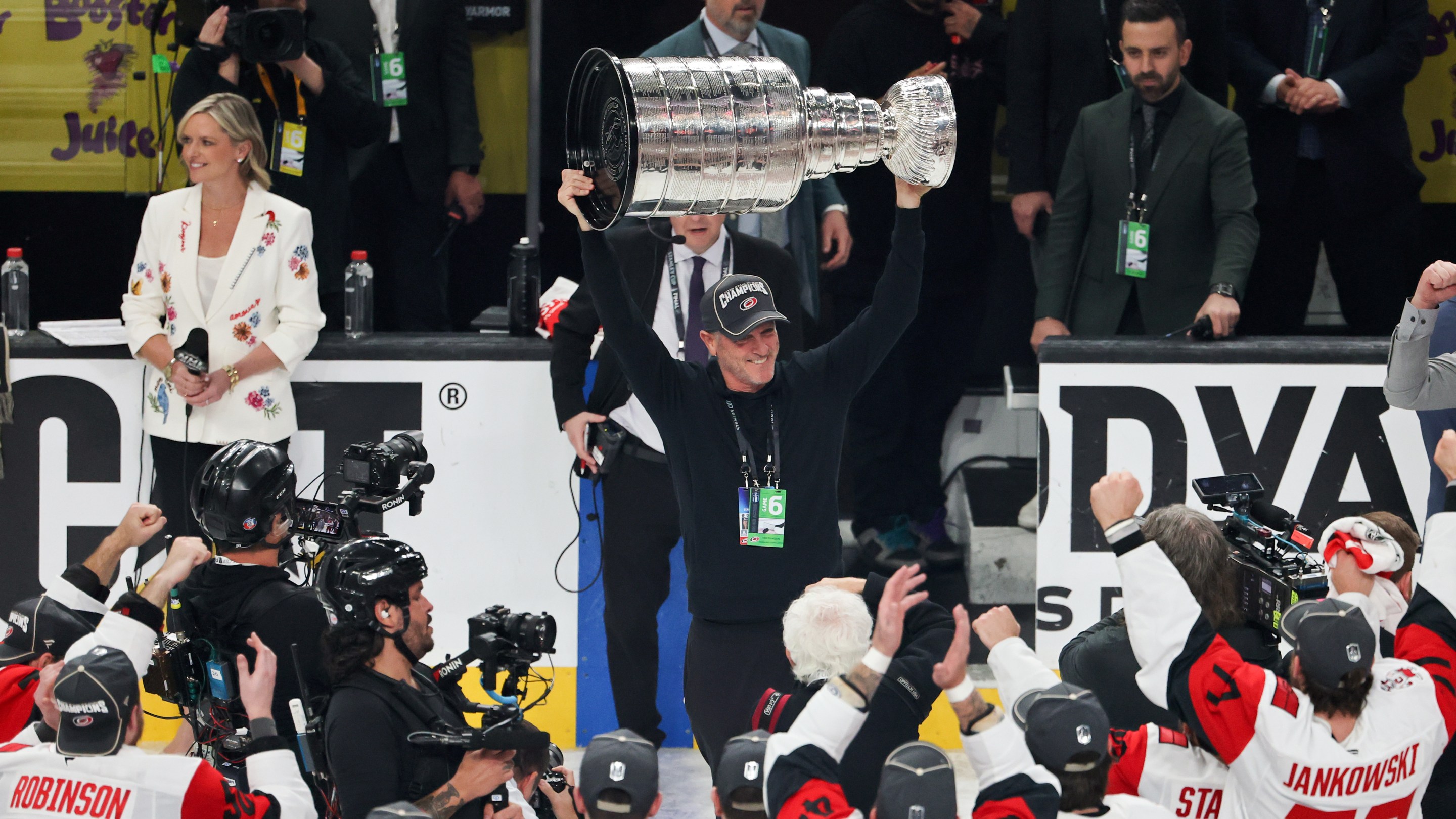 LAS VEGAS, NEVADA - JUNE 14: CEO, owner and governor Tom Dundon of the Carolina Hurricanes hoists the Stanley Cup after the team's 3-0 victory over the Vegas Golden Knights in Game Six of the 2026 NHL Stanley Cup Final at T-Mobile Arena on June 14, 2026 in Las Vegas, Nevada. The Hurricanes won the series four games to two. (Photo by Ethan Miller/Getty Images)