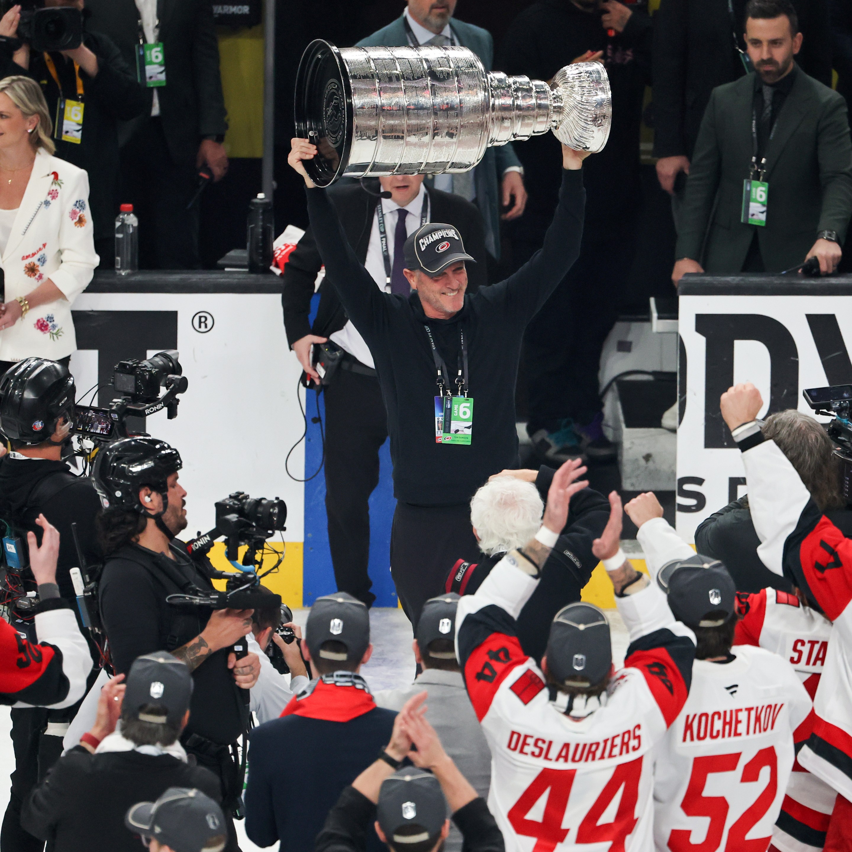 LAS VEGAS, NEVADA - JUNE 14: CEO, owner and governor Tom Dundon of the Carolina Hurricanes hoists the Stanley Cup after the team's 3-0 victory over the Vegas Golden Knights in Game Six of the 2026 NHL Stanley Cup Final at T-Mobile Arena on June 14, 2026 in Las Vegas, Nevada. The Hurricanes won the series four games to two. (Photo by Ethan Miller/Getty Images)