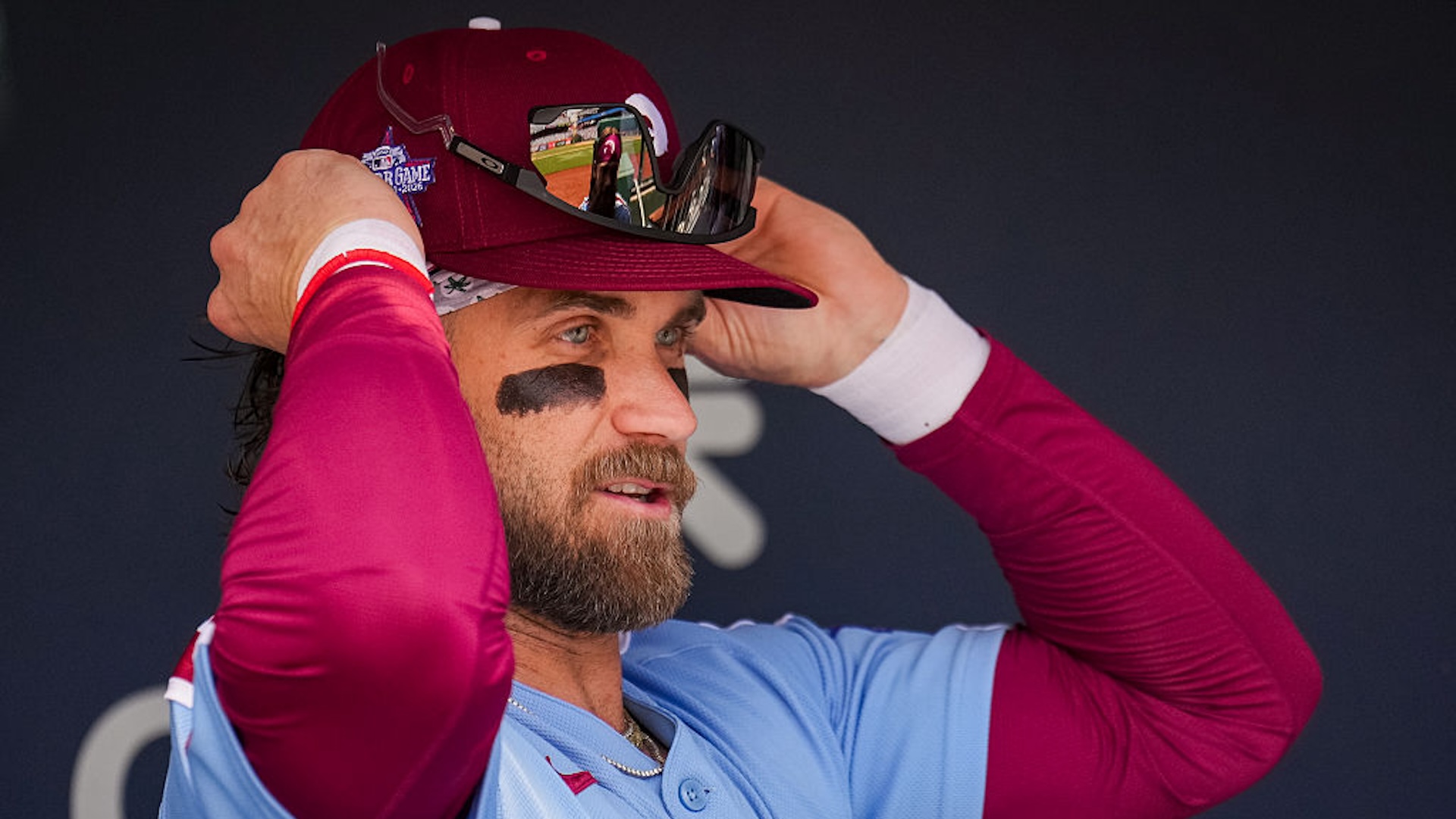 Bryce Harper puts on his hat