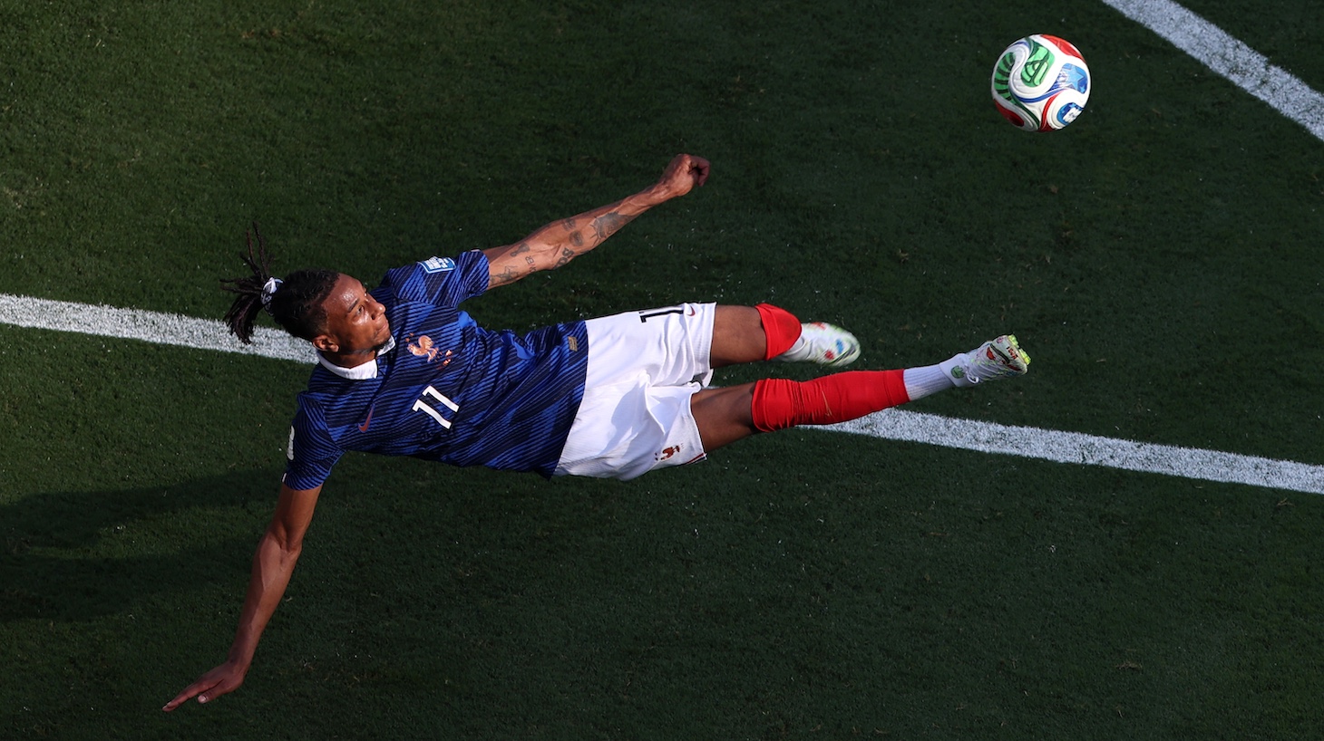 Michael Olise of France attempts an overhead kick which hits the crossbar during the FIFA World Cup 2026 Round Of 32 match between France and Sweden