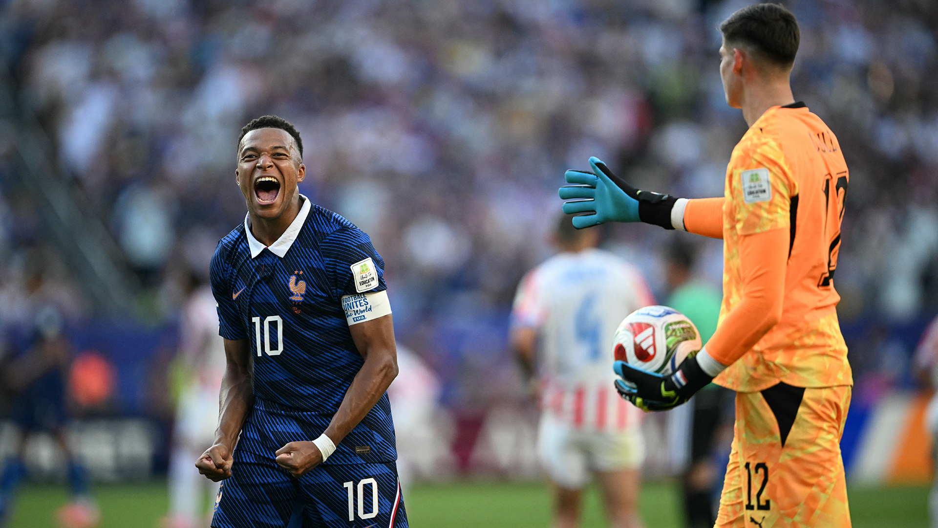 France's forward #10 Kylian Mbappe celebrates past Paraguay's goalkeeper #12 Orlando Gill after winning the 2026 World Cup round of 16 football match between Paraguay and France at the Philadelphia Stadium in Philadelphia on July 4, 2026.