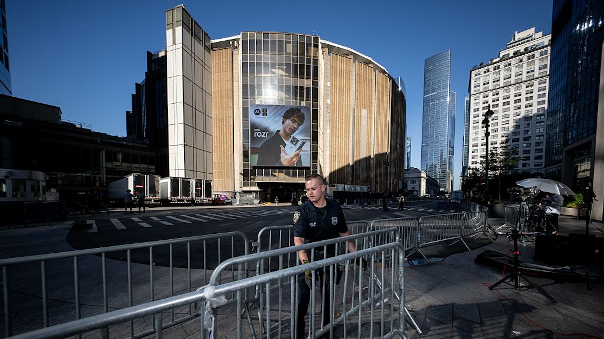 A cop erects barricades outside MSG