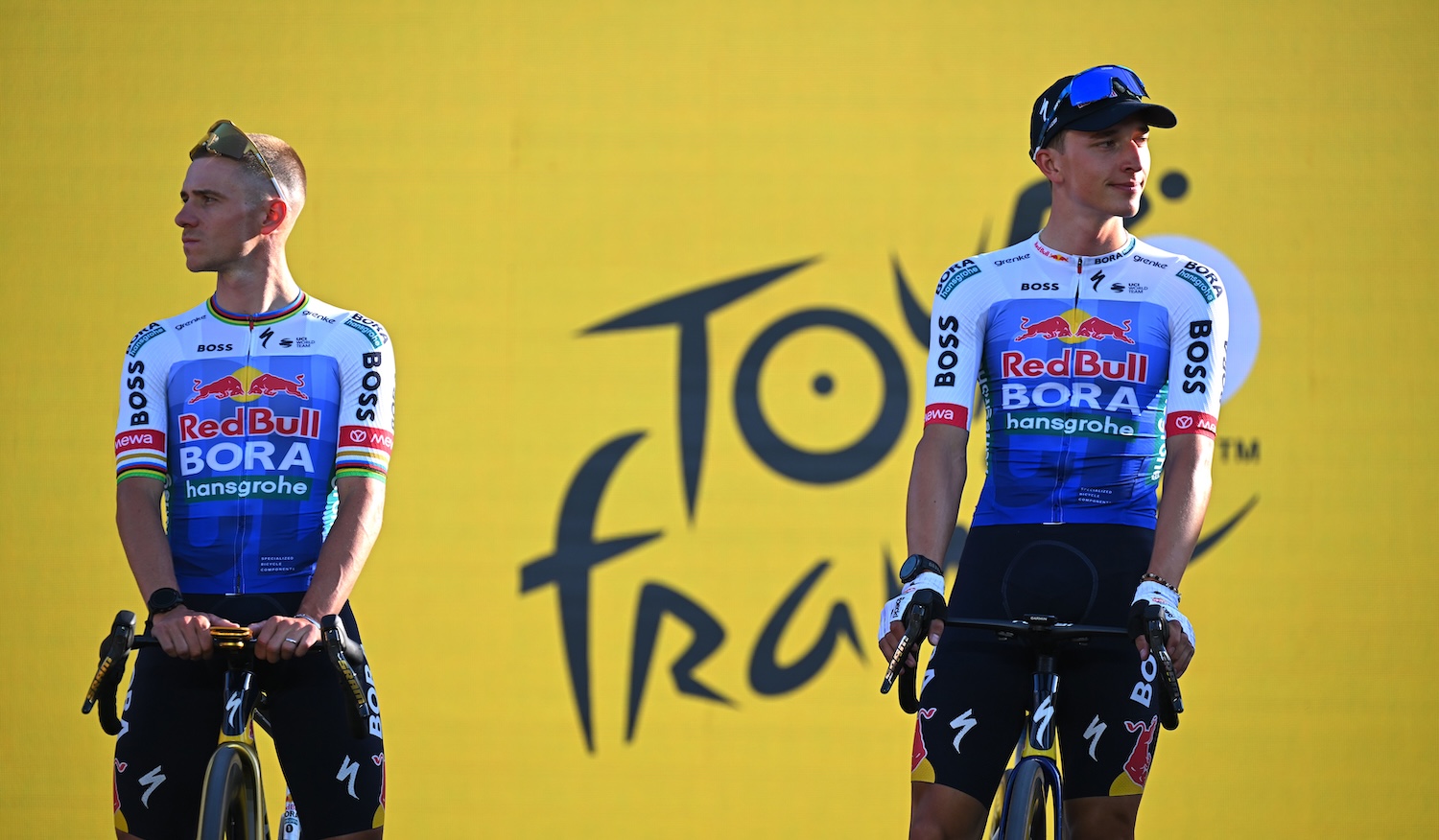 BARCELONA, SPAIN - JULY 02: (L-R) Remco Evenepoel of Belgium and Florian Lipowitz of Germany and Team Red Bull - BORA - hansgrohe during the team presentation prior to the 113th Tour de France 2026 / #UCIWT / on July 02, 2026 in Barcelona, Spain. (Photo by Tim de Waele/Getty Images)