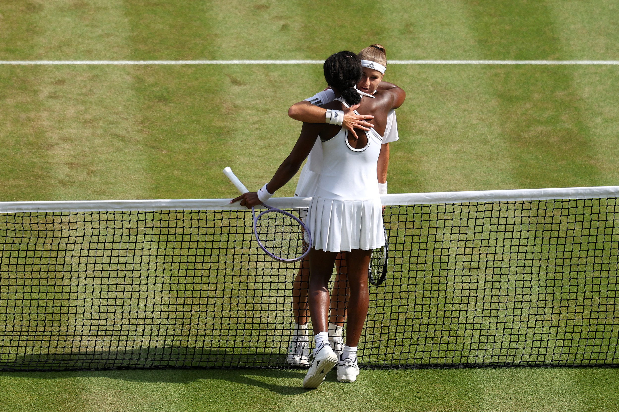 Karolina Muchova of Czechia and Coco Gauff of United States interact at the net following their Ladies' Singles semifinal match on day eleven of The Championships Wimbledon 2026 at All England Lawn Tennis and Croquet Club on July 09, 2026 in London, England. (Photo by Cameron Spencer/Getty Images)