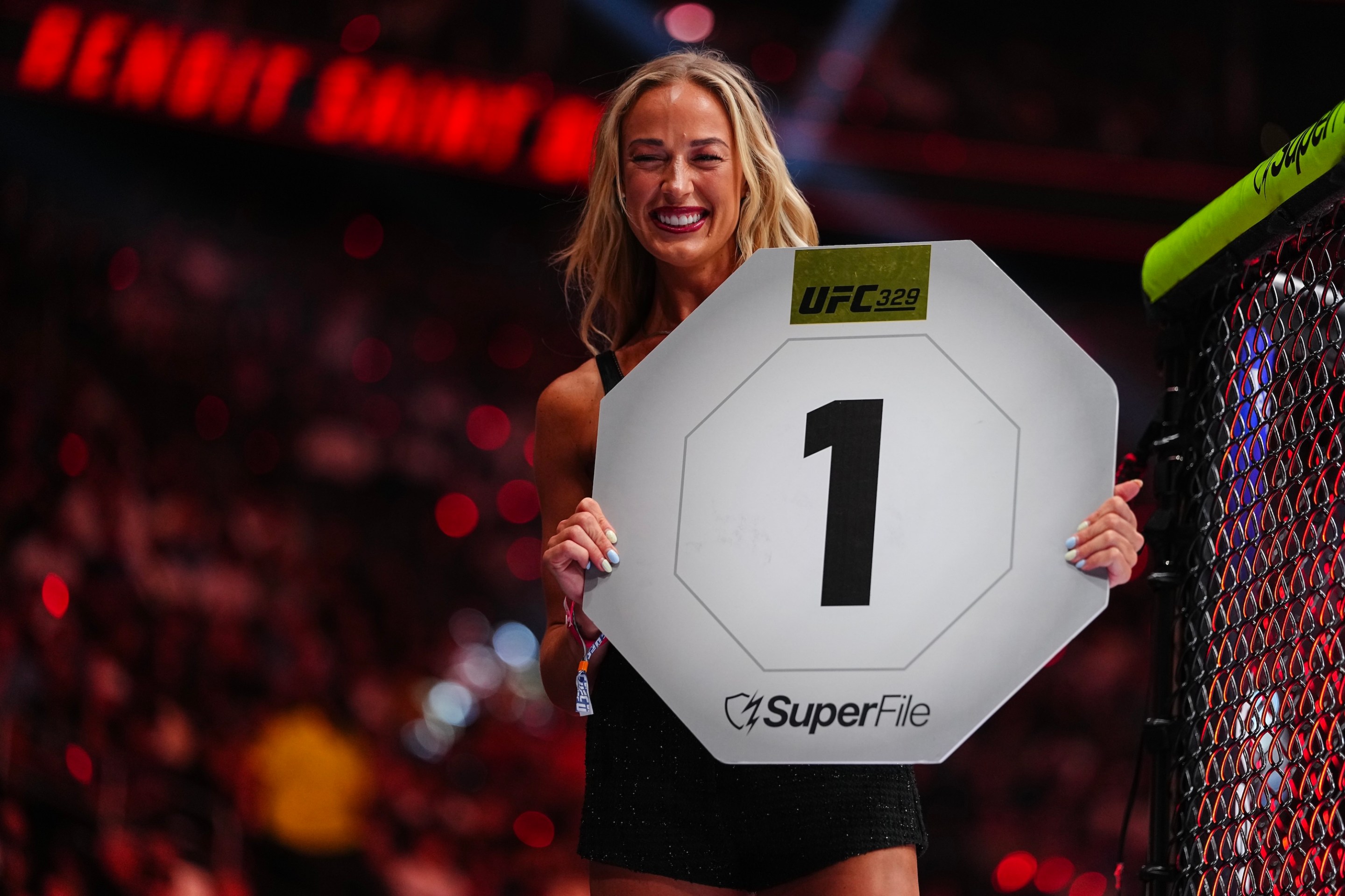Sophie Cunningham announces a round in a lightweight fight during the UFC 329 event at T-Mobile Arena on July 11, 2026 in Las Vegas, Nevada.
