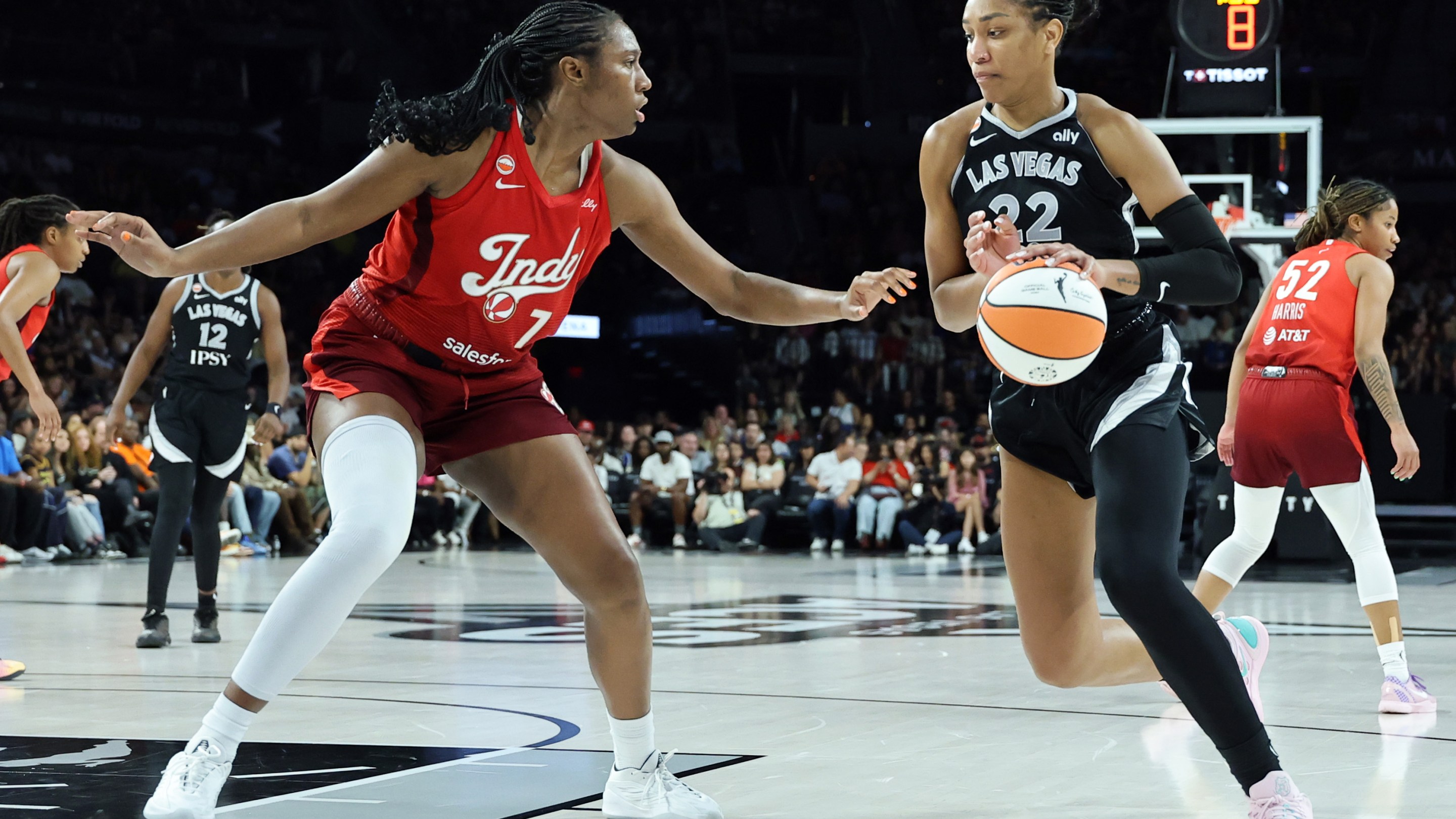 A'ja Wilson #22 of the Las Vegas Aces drives against Aliyah Boston #7 of the Indiana Fever in the second quarter of their game at Michelob ULTRA Arena on July 12, 2026 in Las Vegas, Nevada.