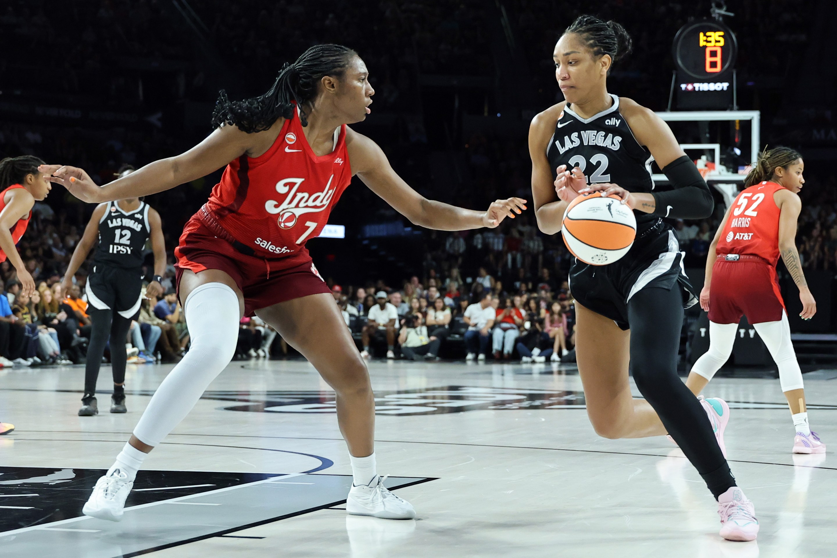 A'ja Wilson #22 of the Las Vegas Aces drives against Aliyah Boston #7 of the Indiana Fever in the second quarter of their game at Michelob ULTRA Arena on July 12, 2026 in Las Vegas, Nevada.