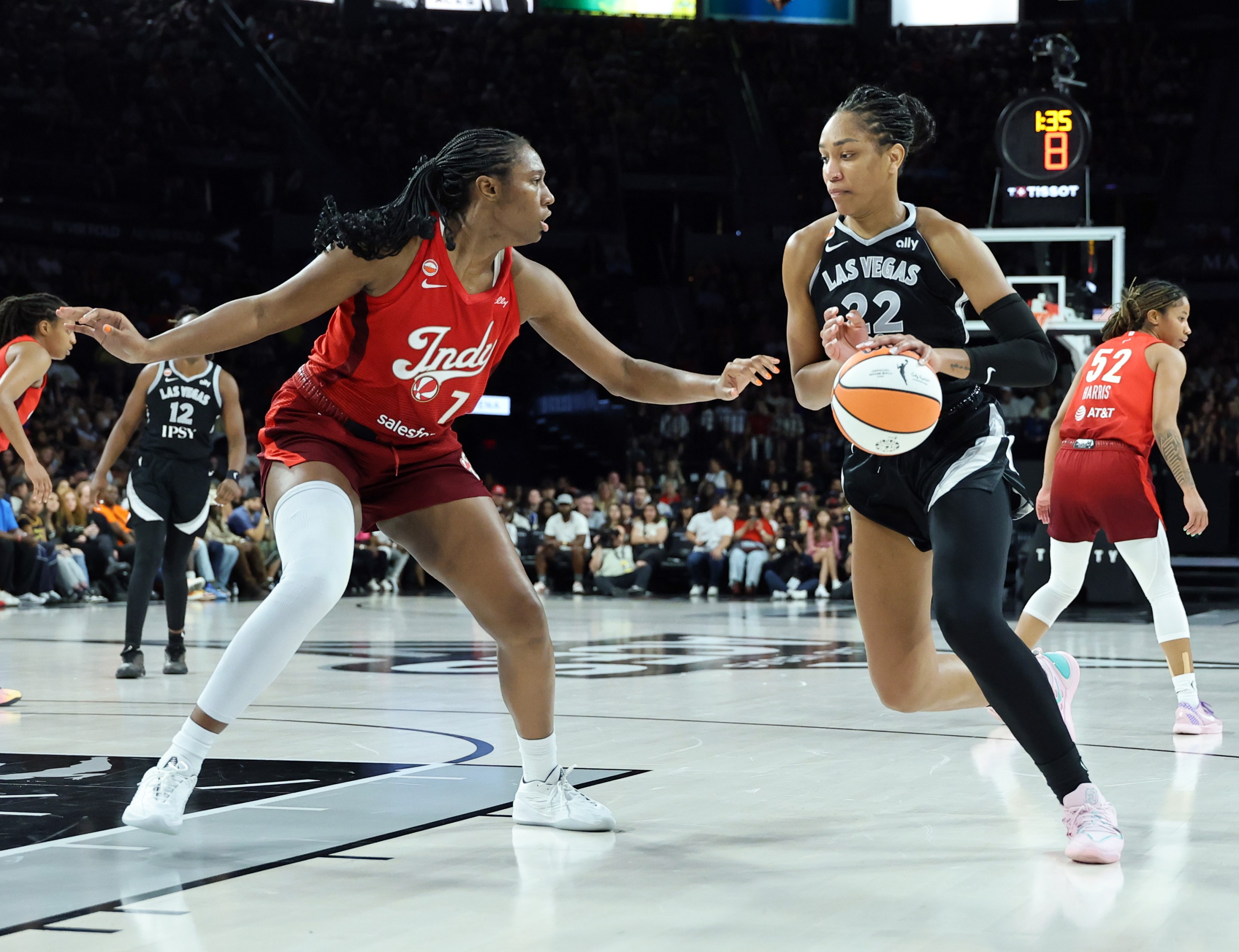 A'ja Wilson #22 of the Las Vegas Aces drives against Aliyah Boston #7 of the Indiana Fever in the second quarter of their game at Michelob ULTRA Arena on July 12, 2026 in Las Vegas, Nevada.