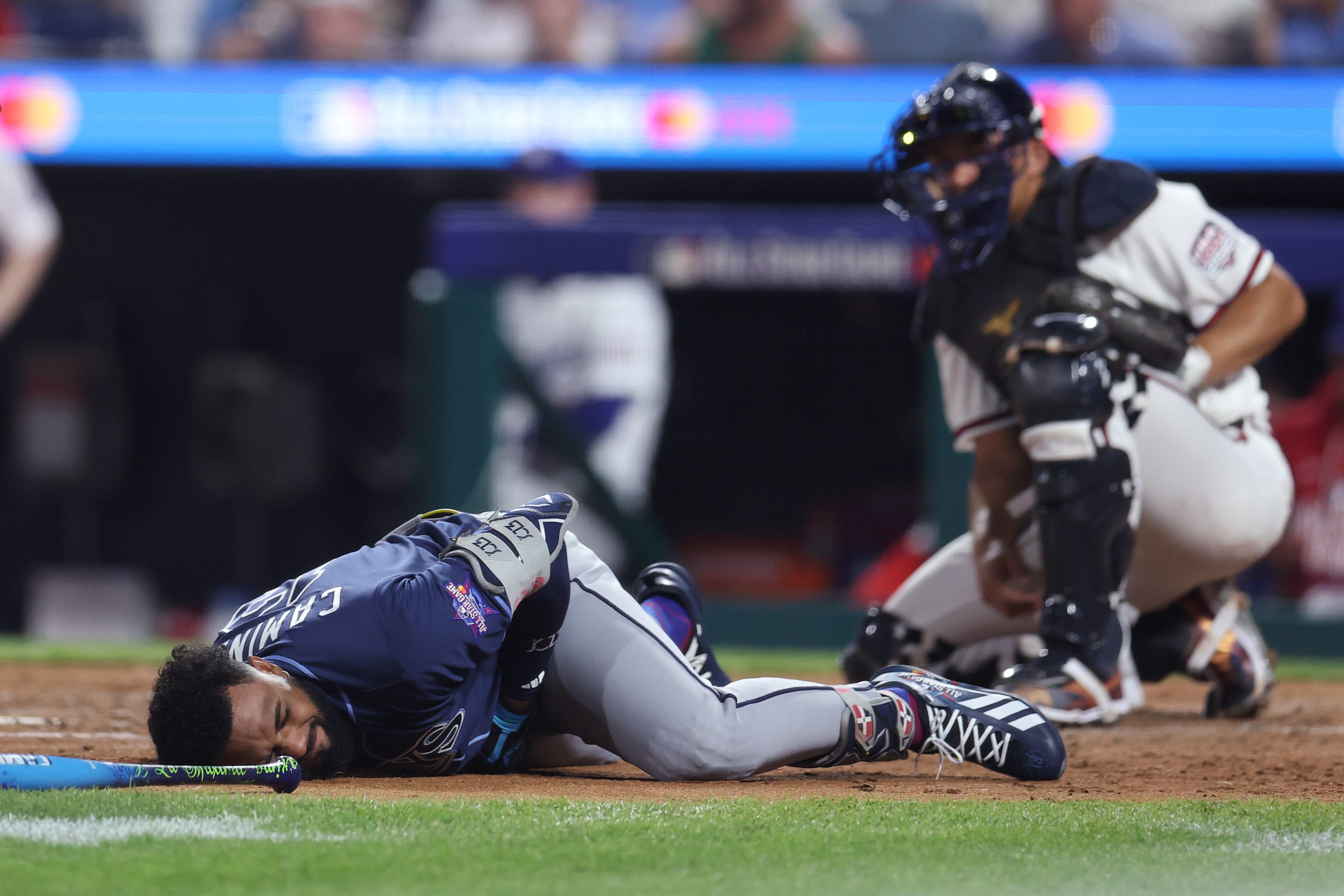 Junior Caminero #13 of the Tampa Bay Rays is hit by a pitch