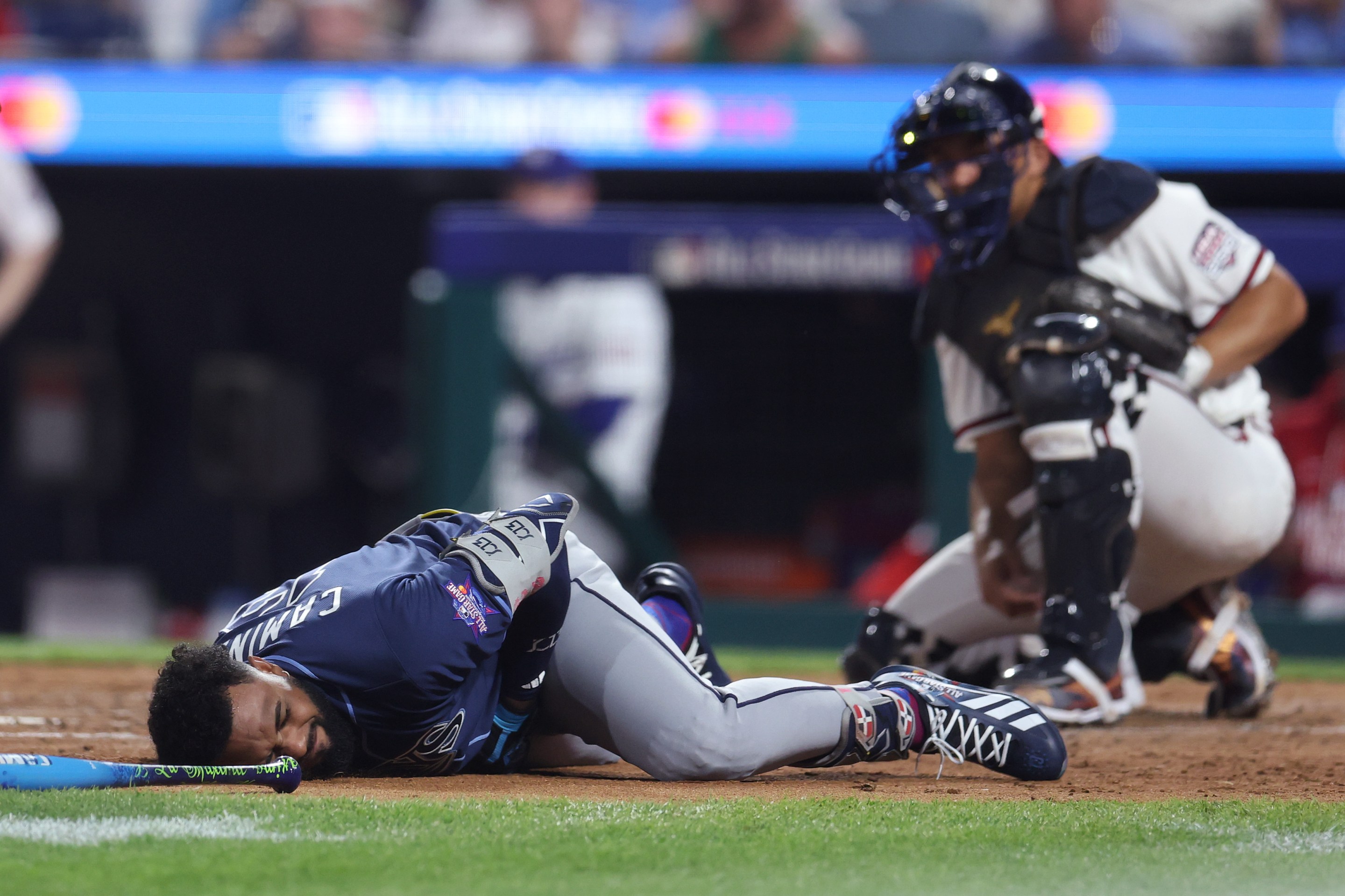 Junior Caminero #13 of the Tampa Bay Rays is hit by a pitch