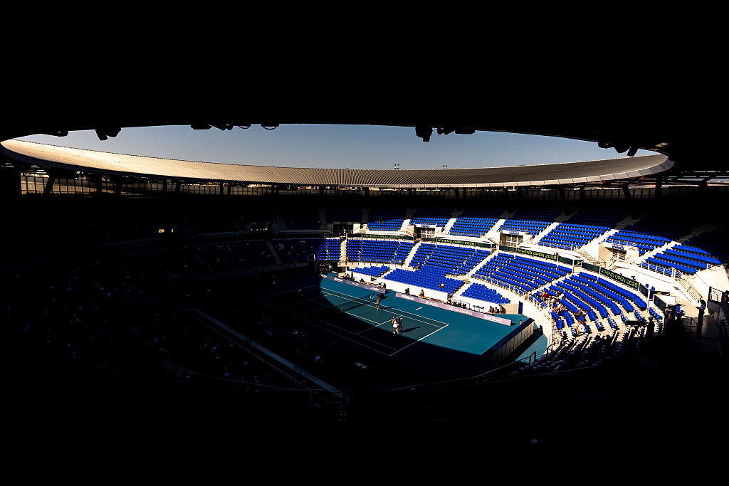 Shadows falling on a tennis stadium