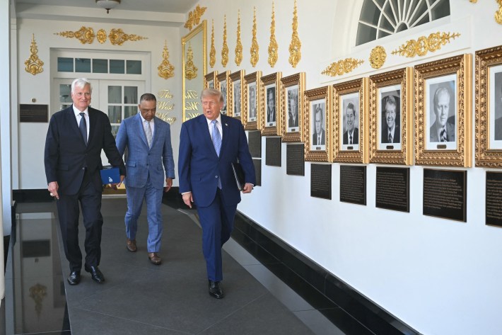 US President Donald Trump, Los Angeles Dodgers owner Mark Walter (L) and manager Dave Roberts (C) arrive to a ceremony to honor the 2025 World Series champions Los Angeles Dodgers in the Rose Garden at the White House in Washington, DC, on July 23, 2026.