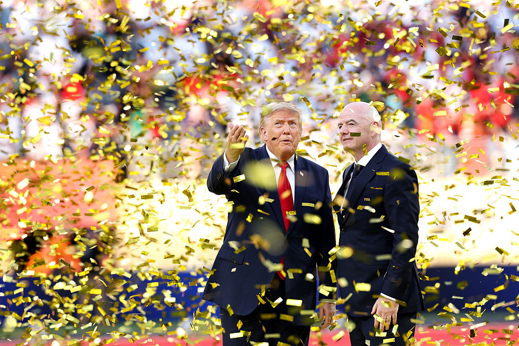 U.S. President Donald Trump and FIFA President Gianni Infantino look on after presenting the FIFA World Cup Winner's Trophy to Spain during the FIFA World Cup 2026 Final match between Spain and Argentina at New York New Jersey Stadium on July 19, 2026 in East Rutherford, New Jersey.