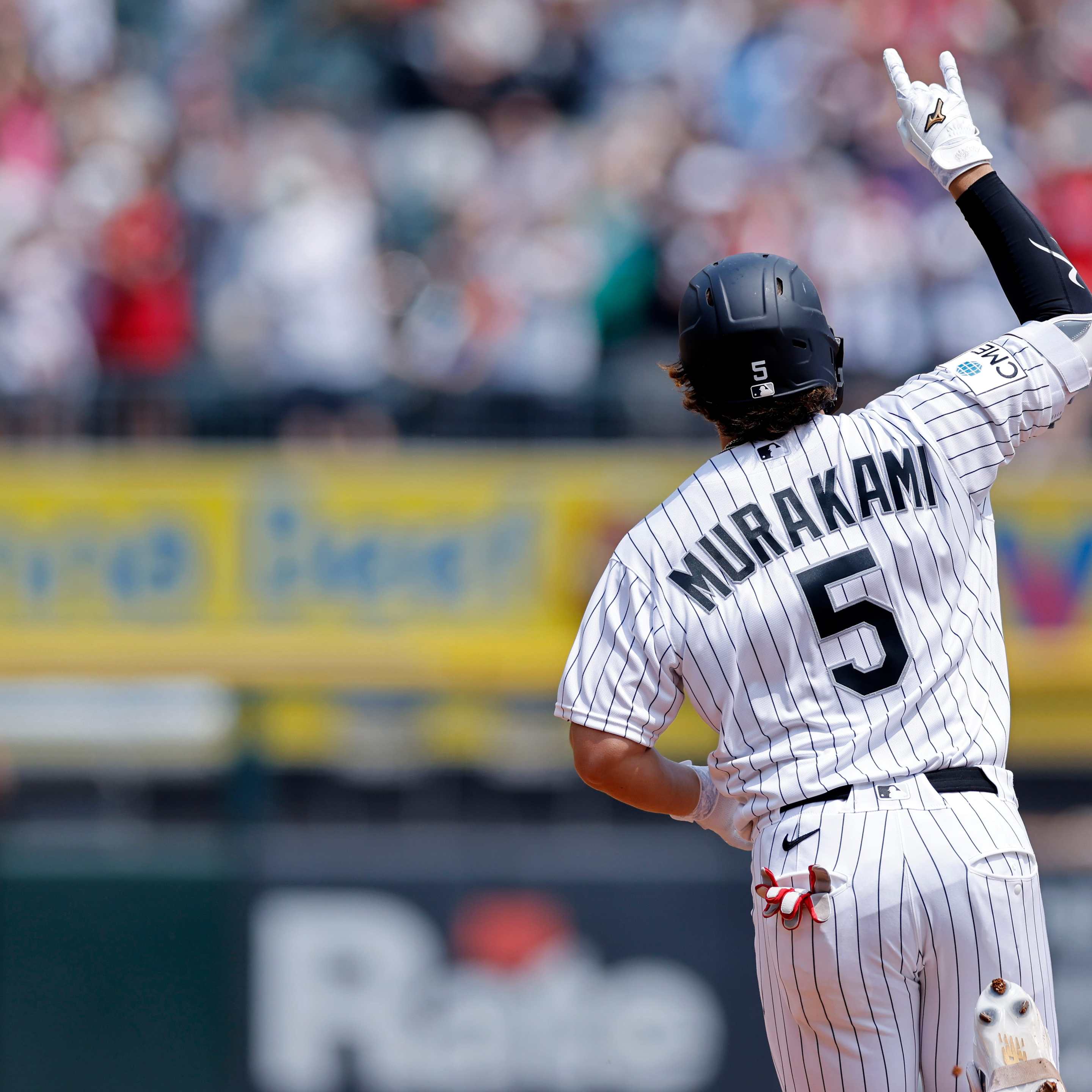Munetaka Murakami (5) of the Chicago White Sox reacts after hitting a two-run home run