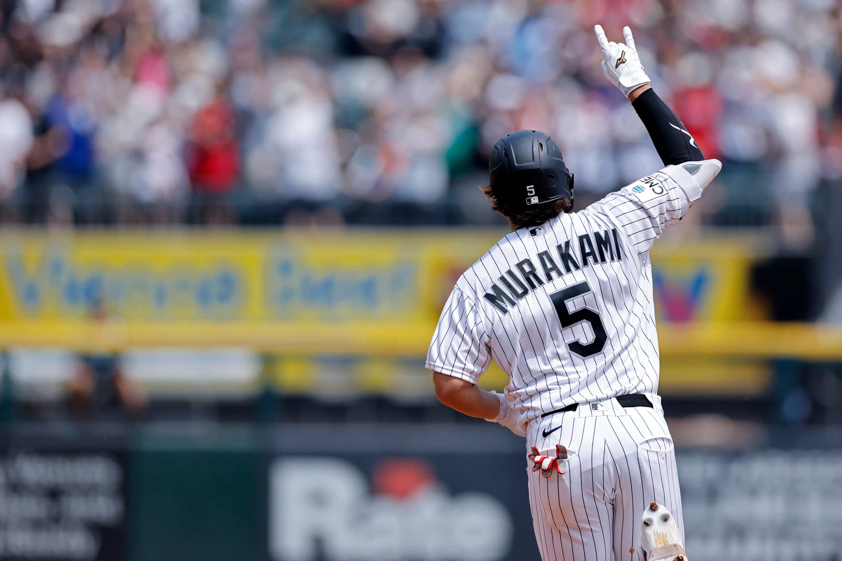 Munetaka Murakami (5) of the Chicago White Sox reacts after hitting a two-run home run