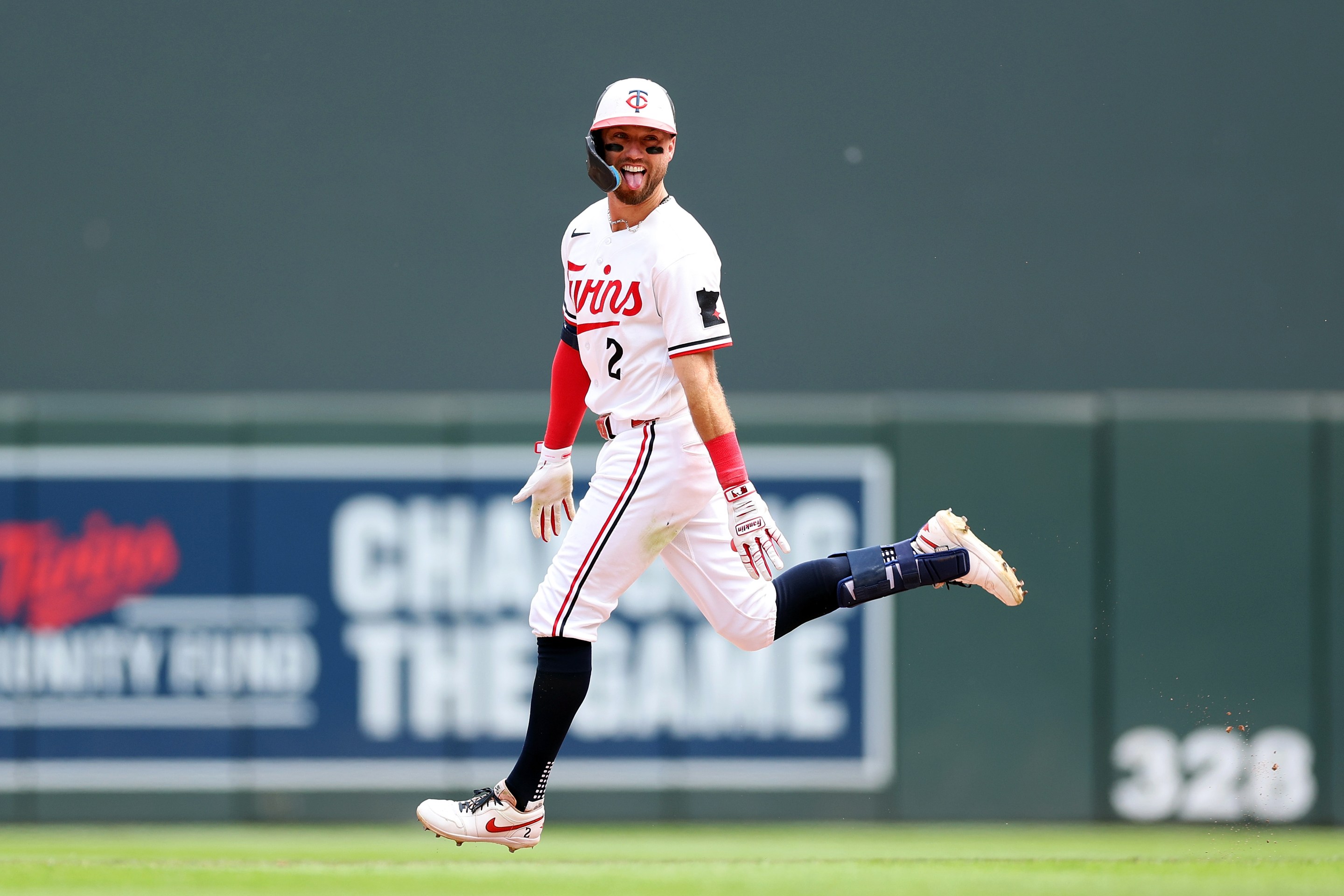Kody Clemens #2 of the Minnesota Twins celebrates his walk-off, grand slam as he rounds the bases against the Kansas City Royals in the ninth inning