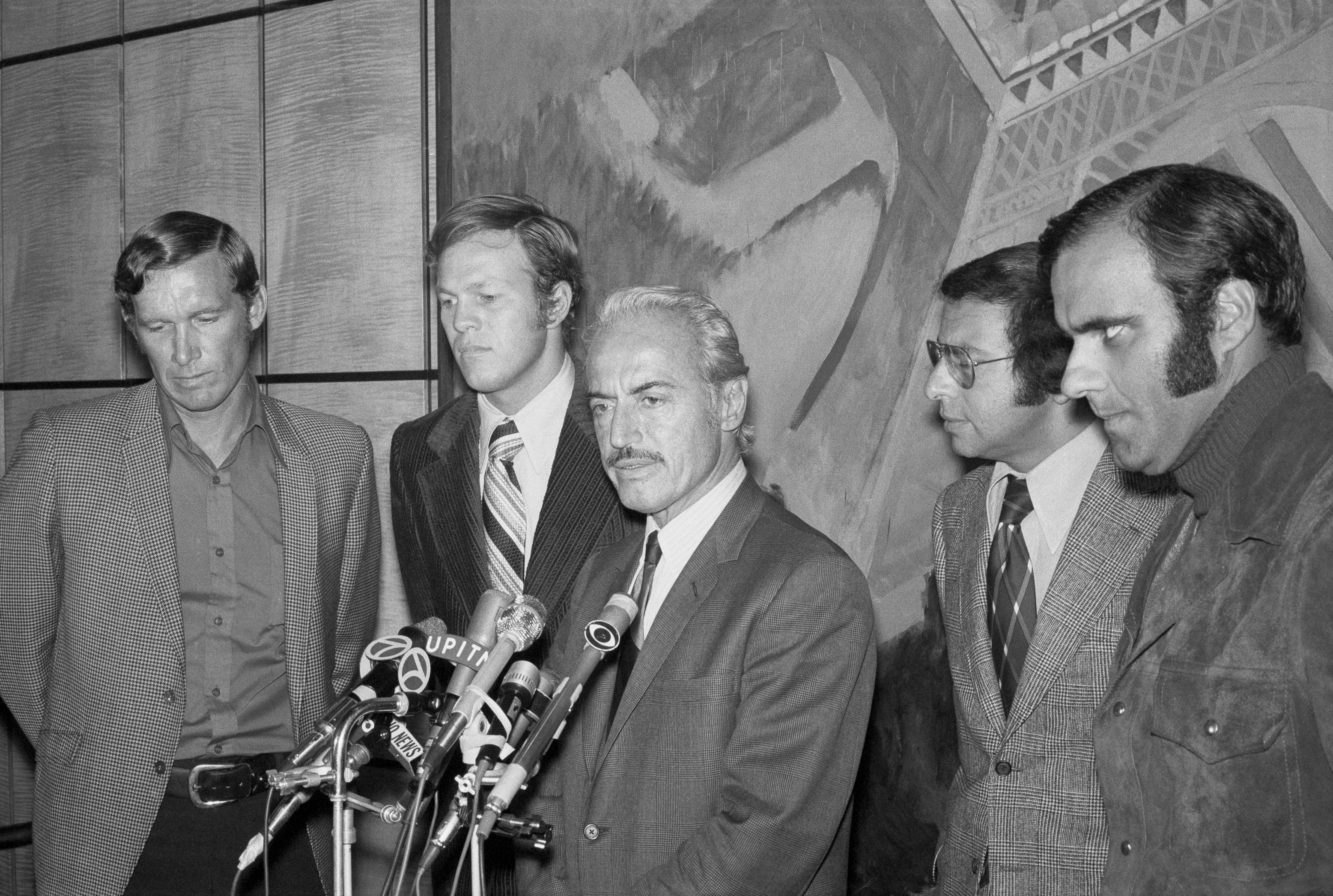 Marvin Miller, executive director of the baseball players association, chats with players here after announcing a settlement has been reached to end the 13-day old players strike and that the season would begin in April of 1972. The other people in the photo are lawyer Richard Moss and MLBPA player reps Joe Torre, Wes Parker, and Gary Peters.