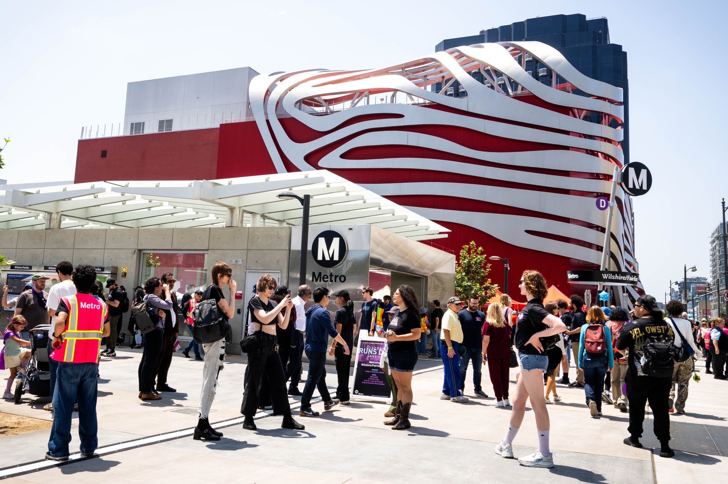 People celebrate the opening of the Metro D Line Extension's Wilshire/Fairfax station in Los Angeles on Friday, May 8, 2026.