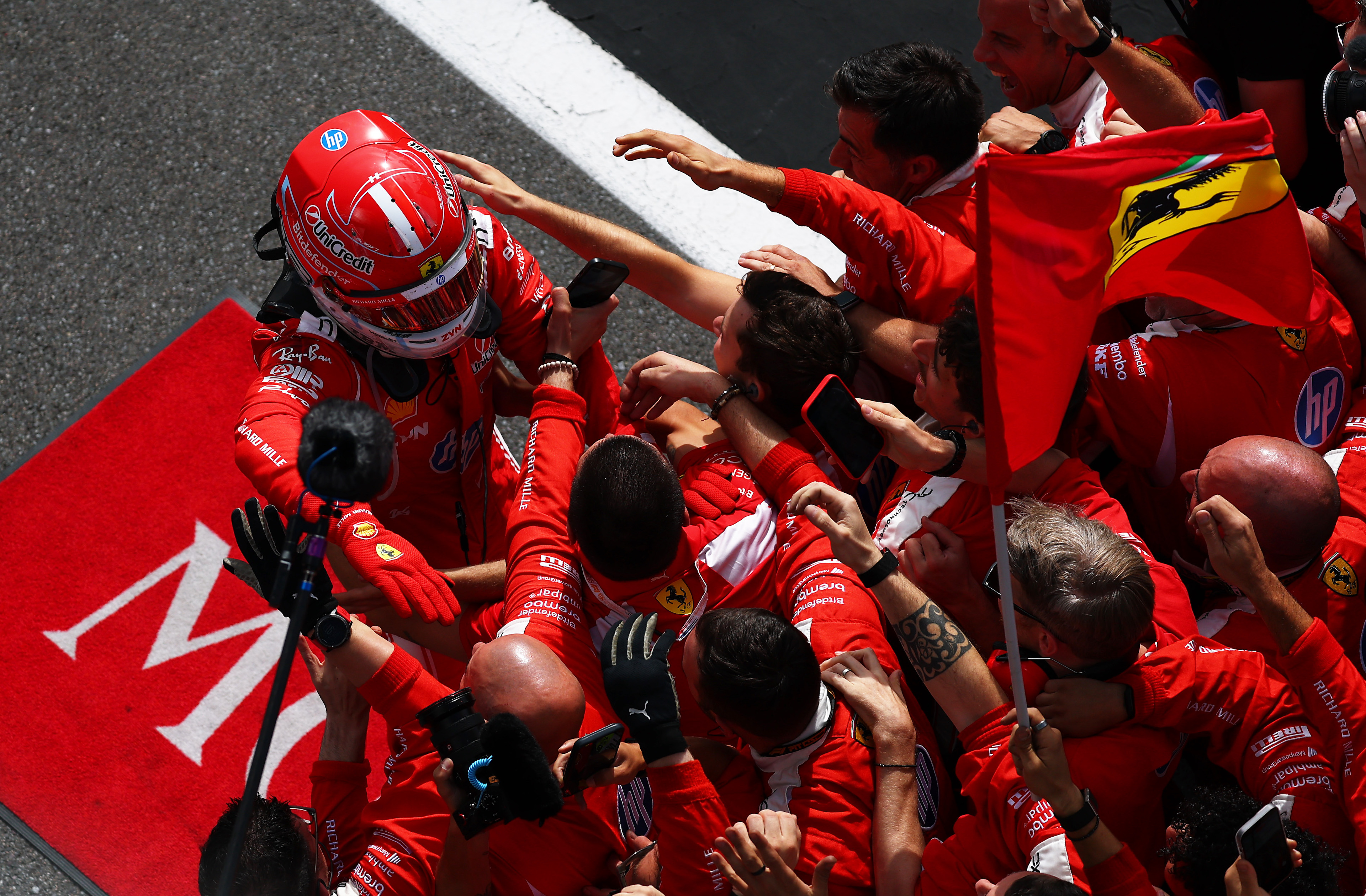 Race winner Charles Leclerc of Monaco and Scuderia Ferrari celebrates on arrival in parc ferme during the F1 Grand Prix of Great Britain at Silverstone Circuit.