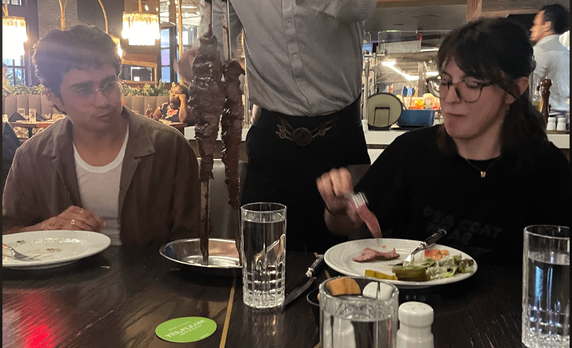 Sarah and Sohini eat dinner