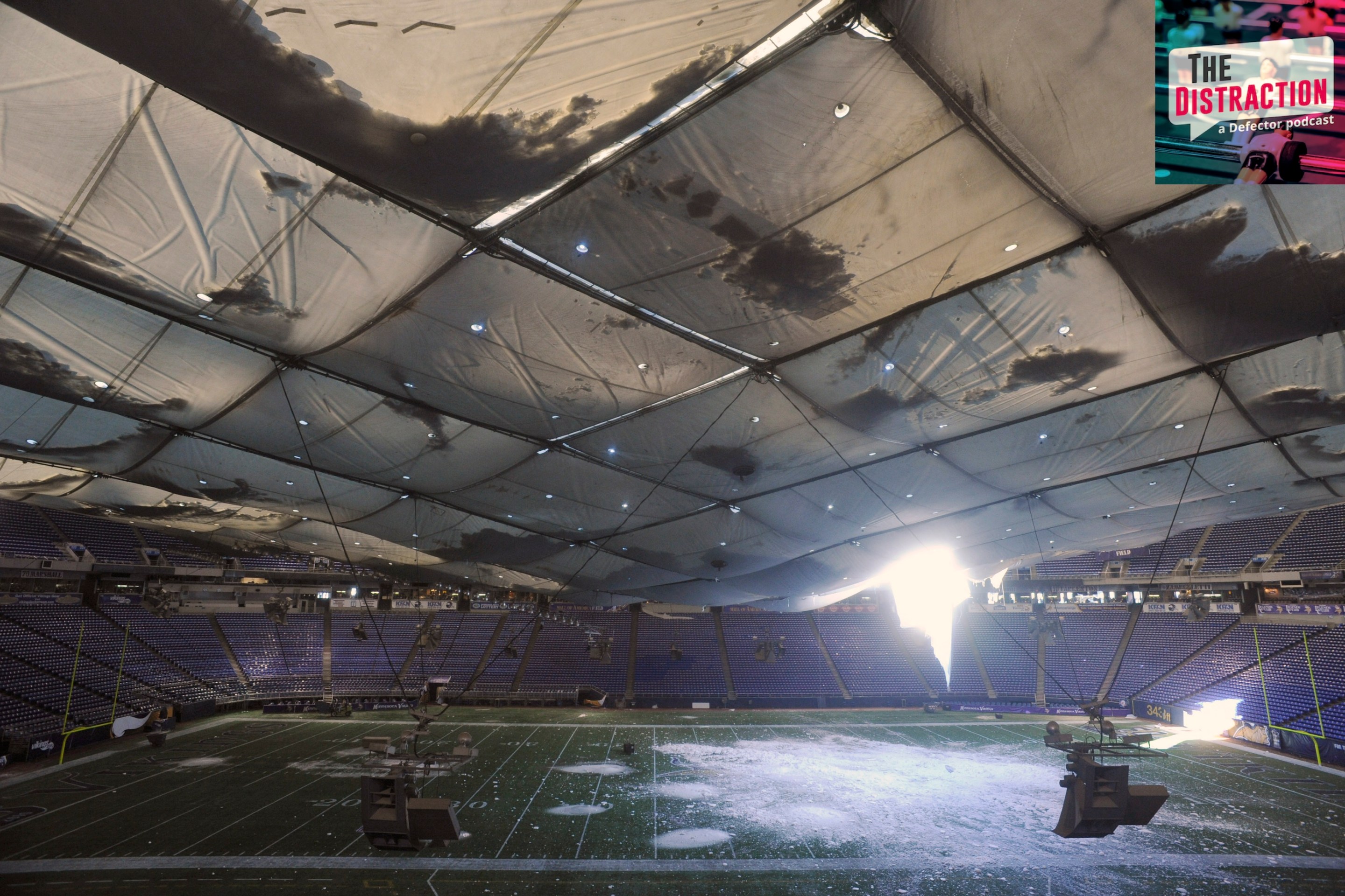 A torn section of the roof sags inside the Hubert H. Humphrey Metrodome on December 13, 2010 in Minneapolis, Minnesota. The Metrodome's roof collapsed under the weight of snow after a powerful blizzard hit the area on December 12, 2010.