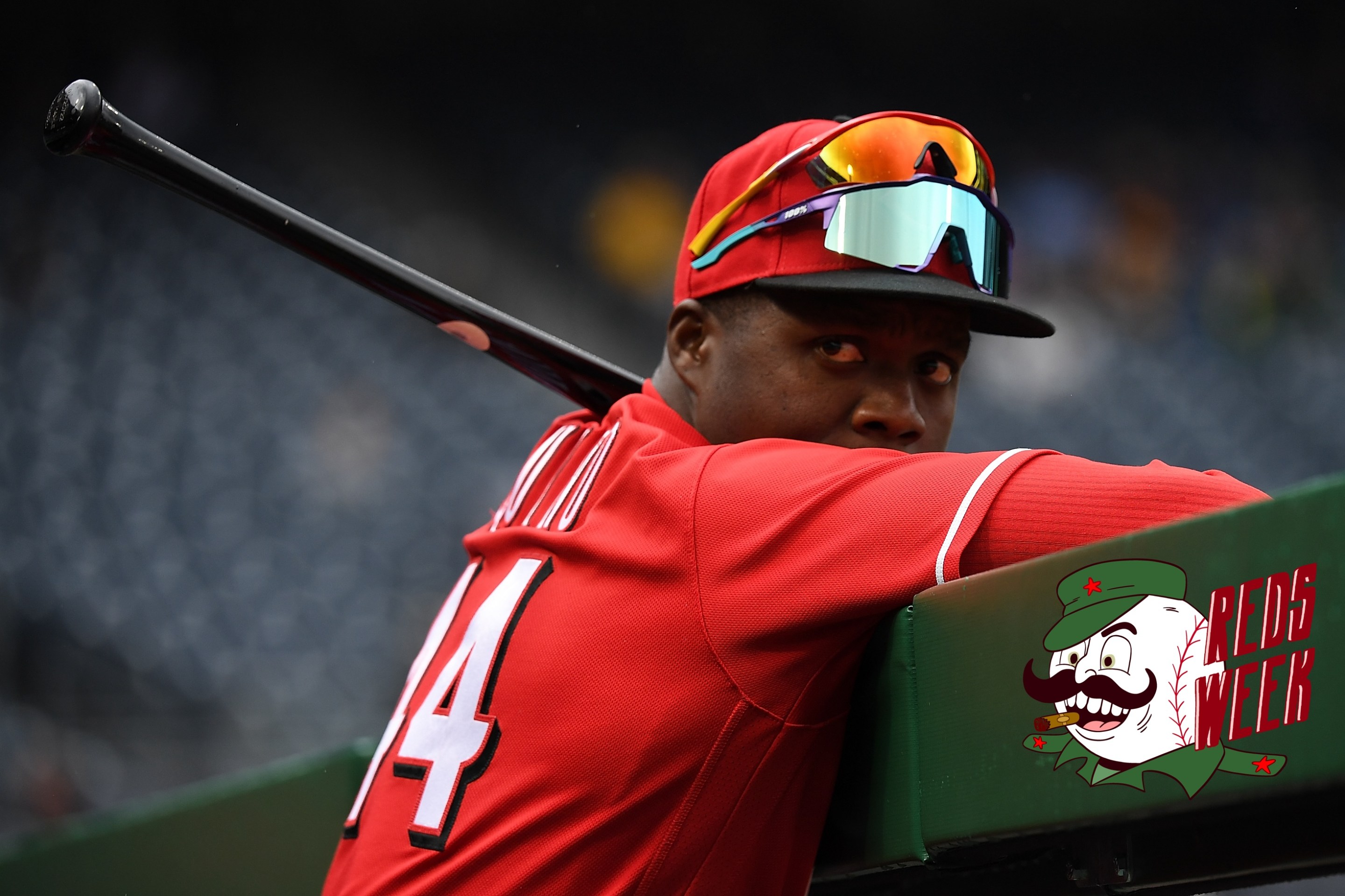 Aristides Aquino of the Cincinnati Reds looks on from the dugout in the eighth inning during the game against the Pittsburgh Pirates at PNC Park on September 28, 2022 in Pittsburgh, Pennsylvania.