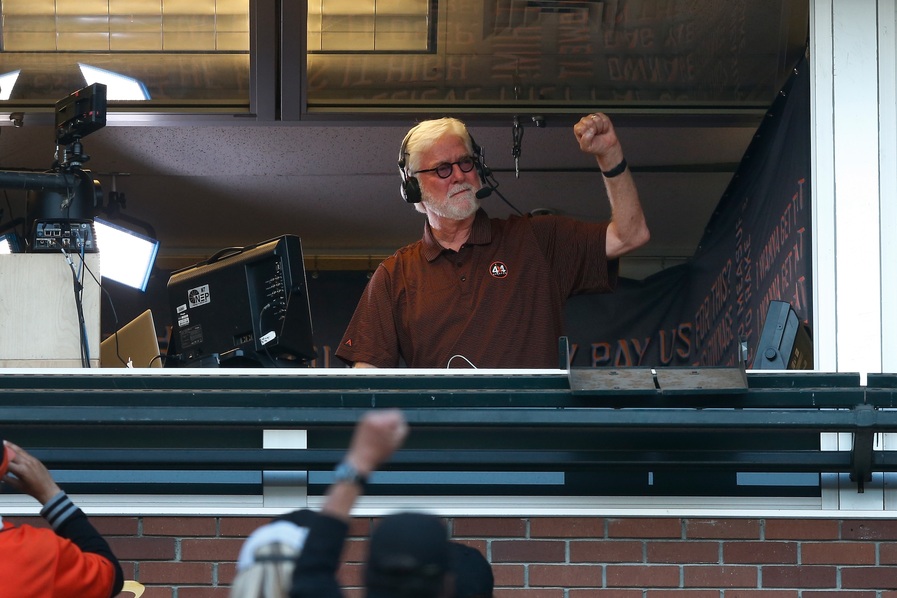 Sportscaster Mike Krukow watches from the broadcast center between the San Francisco Giants and the San Diego Padres at Oracle Park on October 1, 2021 in San Francisco, California.