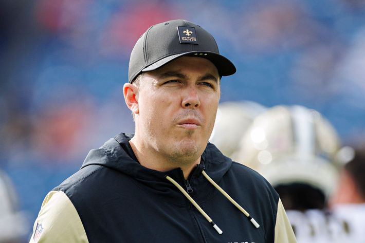 Head Coach Kellen Moore of the New Orleans Saints on the field before a game against the Tennessee Titans at Nissan Stadium on December 28, 2025 in Nashville, Tennessee. The Saints defeated the Titans 34-26.