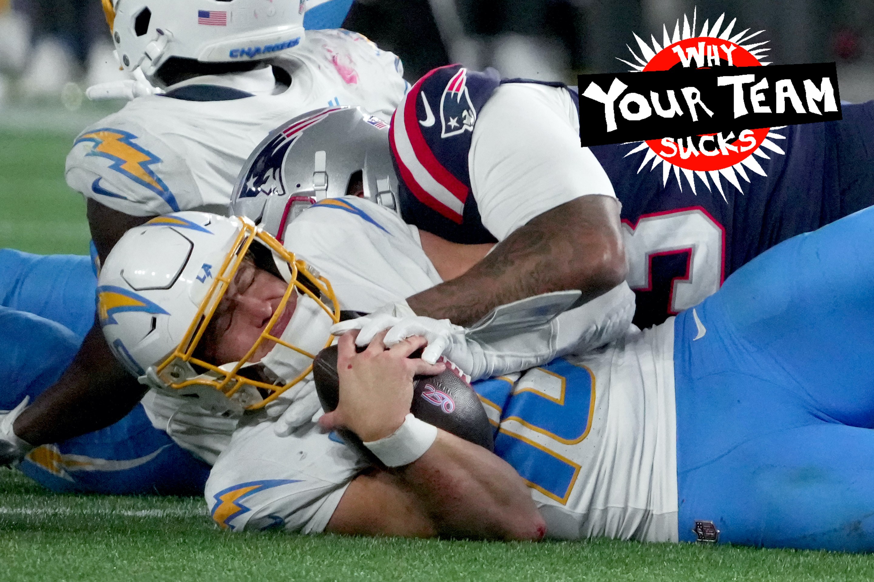 Los Angeles Chargers quarterback Justin Herbert is sacked by New England Patriots linebacker Anfernee Jennings in the fourth quarter.