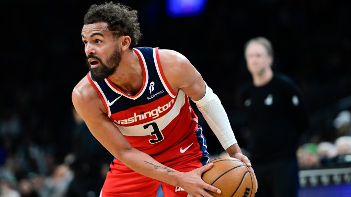 Trae Young #3 of the Washington Wizards looks on during a game against the Boston Celtics at TD Garden on March 14, 2026 in Boston, Massachusetts.