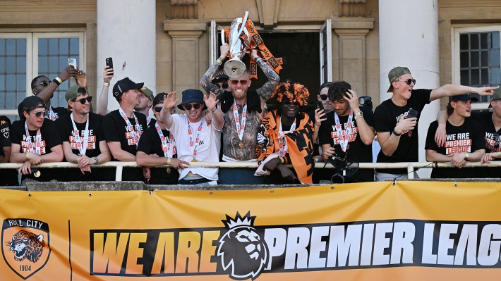 Hull City's Oliver McBurnie celebrates after a victory parade in Hull. Hull City have been promoted to the Premier League after beating Middlesbrough 1-0 in the Championship play-off final at Wembley. Hull emerged from the chaos of the Championship play-offs to beat Middlesbrough in the 'Spygate' final at Wembley and seal a return to the Premier League. Picture date: Monday May 25, 2026.