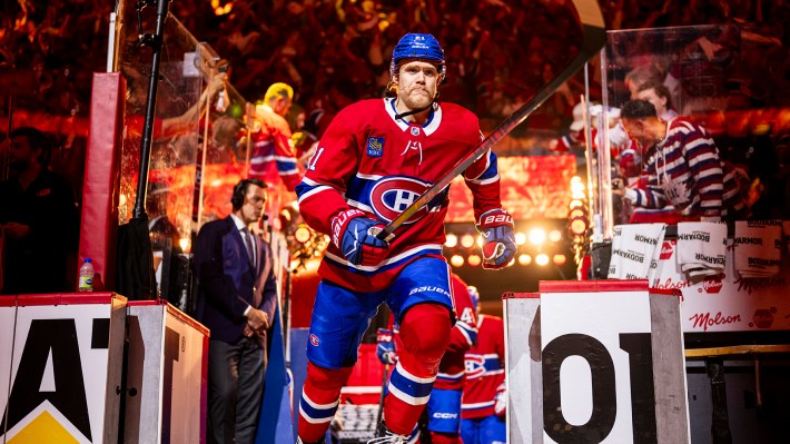 Kaiden Guhle #21 of the Montreal Canadiens skates onto the ice during the opening ceremonies of Game Four of the Eastern Conference Final of the 2026 Stanley Cup Playoffs between the Montreal Canadiens and the Carolina Hurricanes at the Bell Centre on May 27, 2026 in Montreal, Quebec, Canada.
