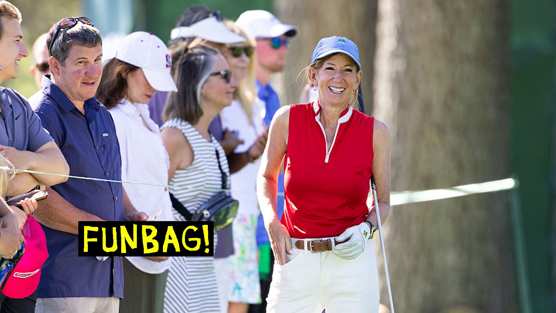 Cathy Engelbert playing golf.
